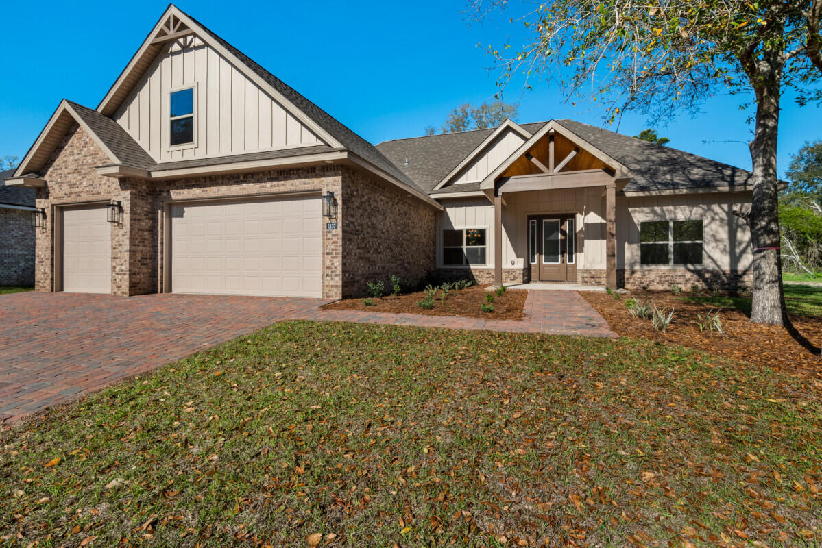 New Construction from Custom Builder!!!  MOVE-IN READY! APRIL 2023.  3,652 SF Living, 6 Bedrooms, 4 Full Baths, 5th Bedroom/Office, Bonus over garage with full bath, Large covered patio, 3-car extra-large garage, attic storage.  Spacious open floor plan with many upgraded features including gas plumbing, gas tankless hot water, gas fireplace on patio, gas cooktop, electric oven, microwave drawer, custom cabinets with wood hood vented outside, tile in wet areas/common area, carpet in bedrooms.  Gourmet kitchen with lots of cabinets/storage, hidden walk-in pantry, premium appliances.  Fully tiled master bath shower, soaker tub, HIS/HERS Vanities.  Natural wood tones, with Luxury Vinyl Plank flooring. Trimmed with crown molding, step ceilings, all wood around windows, and tubs have full tile surrounds.  Extras include 8' Entry Door on large front porch with decorative privacy glass.  Paver driveway. Garage doors are 8' tall for large trucks/SUVs, includes electric garage door openers with WiFi.  Fully bricked exterior with Hardi Trim for a long lasting, low maintenance exterior.  Fully sodded yard with landscaping and sprinkler system.  The back yard is very spacious with plenty of room for a pool and future landscaping plans.    Located in the gated community Soundside Shores with underground utilities, extra high lot with good drainage, short drive to fishing pier and boat launch.  Beaches, shopping, entertainment, and health care are all very convenient.
