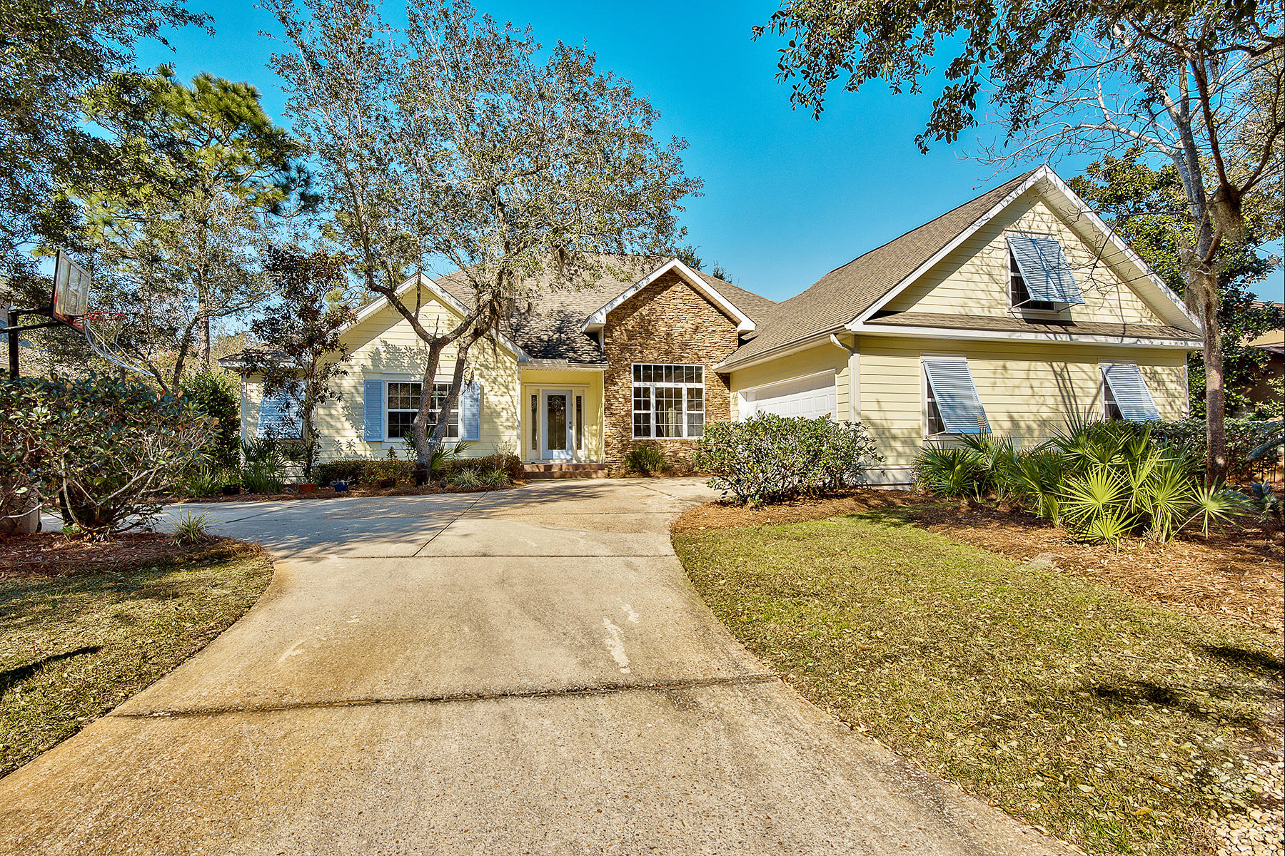 This custom-built home combines modern conveniences with southern charm, securely located within the gates of Botany Bayou. The 2,888 square foot residence has four generous bedrooms and three baths. The grand entrance opens into an attractive living area with feature corner fireplace and French doors leading outside. No expense was spared in outfitting this home with luxurious hardwood flooring throughout the principal living areas and master bedroom. The kitchen is a dream for any chef with extensive silestone counters, a generous island gas cooktop, glass tile backsplash and casual dining space. Surrounded by a large backyard with ample deck space, this distinguished family home has a two car garage. Botany Bayou residents enjoy a neighborhood pool and dock access to Hewett Bayou.