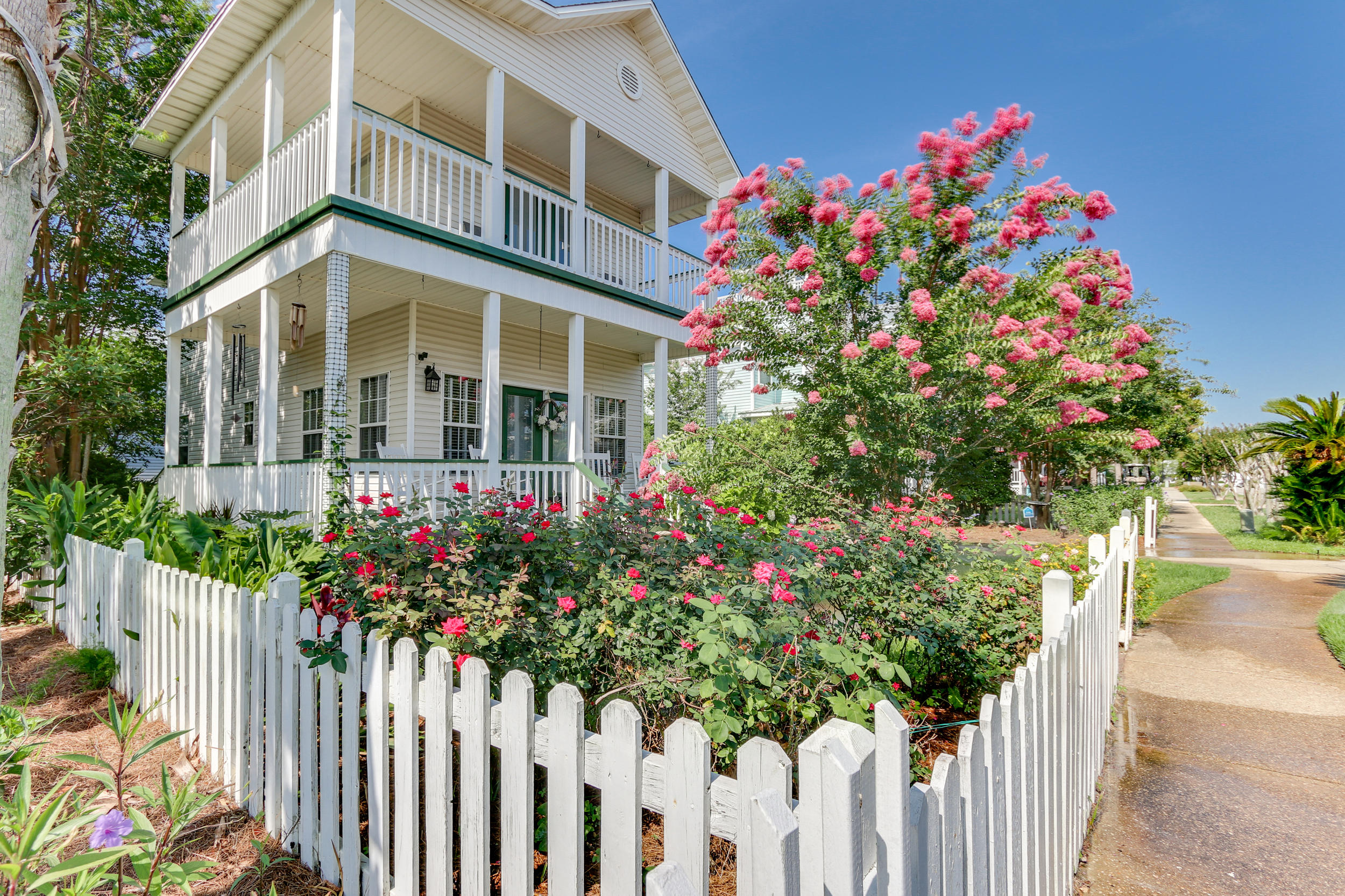 A quintessential beach house just one and half blocks to the beach is complete with a white picket fence in Crystal Beach Cottages...which conjures of images of sun splashed days biking and walking to the beach. Three bedrooms, three full baths, a full size laundry room, and an oversized one car garage complete this amazing home. This home has barely been rented, has upgrades throughout, and much more. Lushly and tropically landscaped exterior with a large decks upstairs and down for alfresco dining and entertaining. Just a hop, skip and a jump to the beach, as well as the private pool right across the street that is available to all Crystal Beach Cottages residents - this is a perfect residence, 2nd home or short/long term rental income producer!