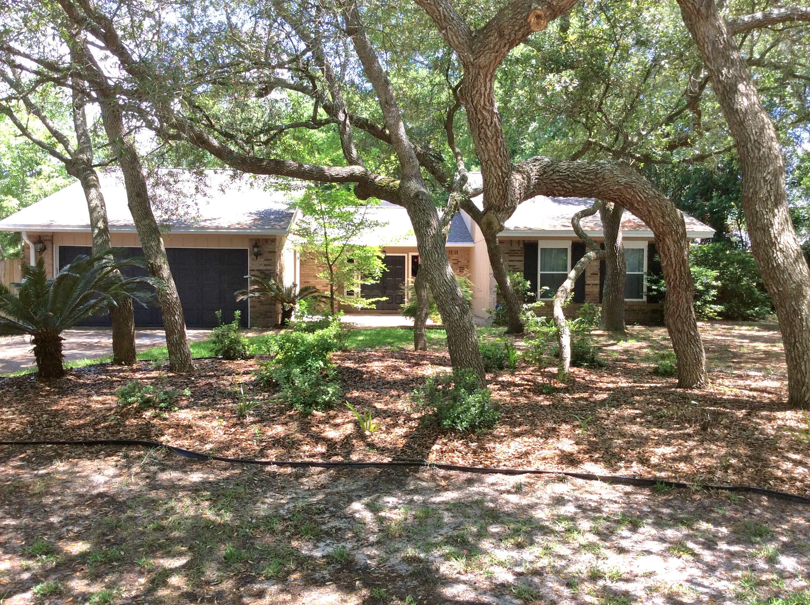 Many updated features in this great 3/2 home. Step-down formal living area features a beautiful tiled wood burning fireplace. Raised formal dining area provides excellent entertaining space. Eat-in kitchen with stainless appliances will delight the chef. Home has non-warranted washer & dryer. Off the kitchen is a great Florida room complete with built in pet door. Updated master suite fit for a king & queen. Beautiful shaded backyard with above ground planters just await your summer colors. Owner even provides lawn service! Owner will consider pets with good applications. Any pet must be spayed/neutered & housebroken. A non-refundable pet fee & a refundable pet deposit are required. Sorry no smoking. All persons 18 years or older are required to complete a separate