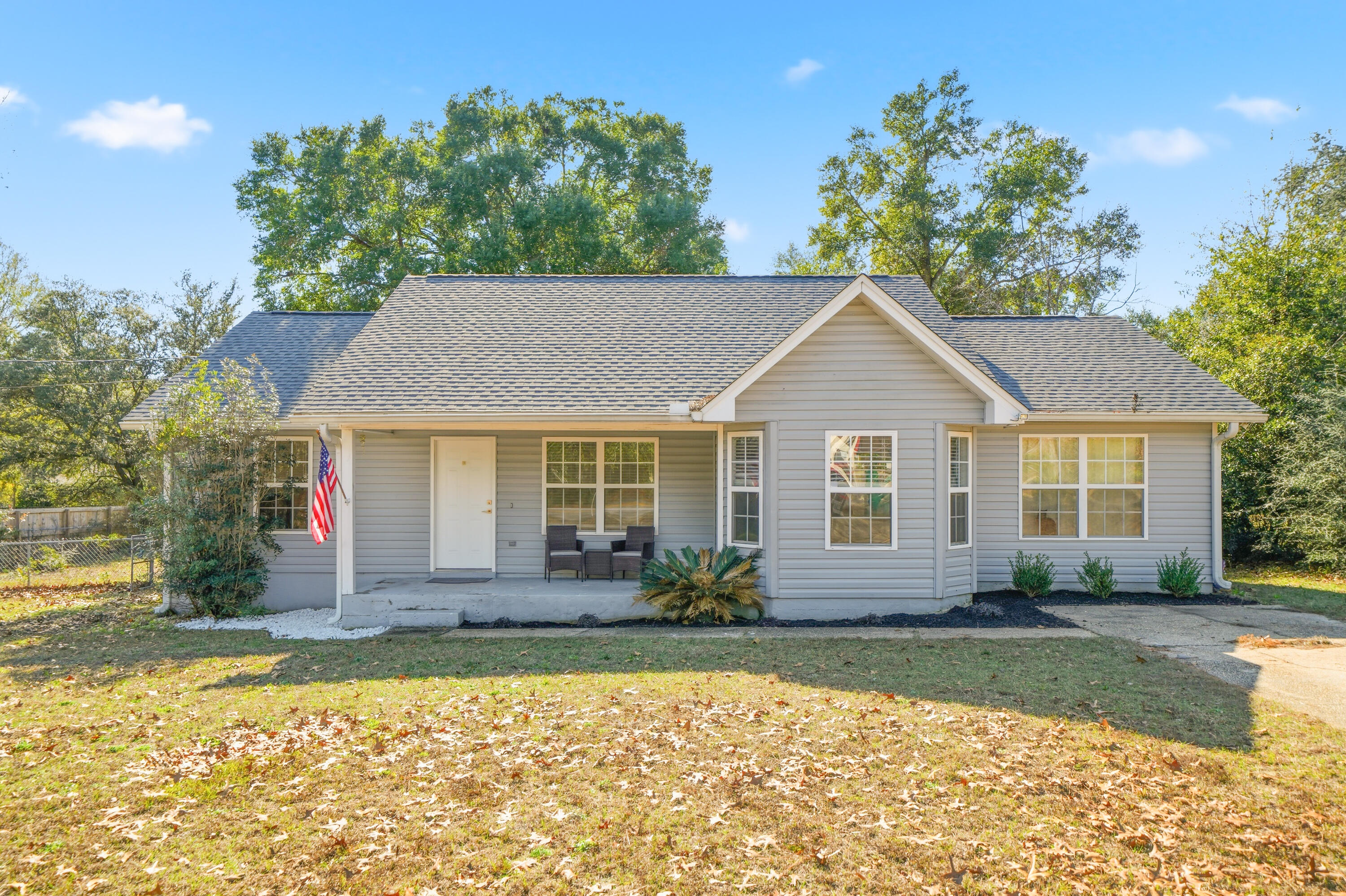 VA Assume 5.25% Beautiful and meticulously maintained home in South Crestview, offering an ideal location near Eglin Air Force Base and Duke Field. Set on a rare half acre cleared lot with no HOA, this property offers the space and freedom to utilize the property without HOA restrictions. The home is move in ready and features a newly remodeled kitchen with updated countertops, cabinetry, under cabinet lighting, and stainless steel appliances. The home offers updated flooring throughout and is completely carpet free. The master bedroom has direct access to a 22 foot deck overlooking the large backyard. Recent improvements also include new landscaping out front, a newer water heater, and a 2022 roof...helping provide peace of mind and potential insurance savings. Two living spaces offe flexibility, with a second living area that can function as an office, playroom, or additional gathering space. Don't miss this affordable, well cared for property and schedule your showing today!