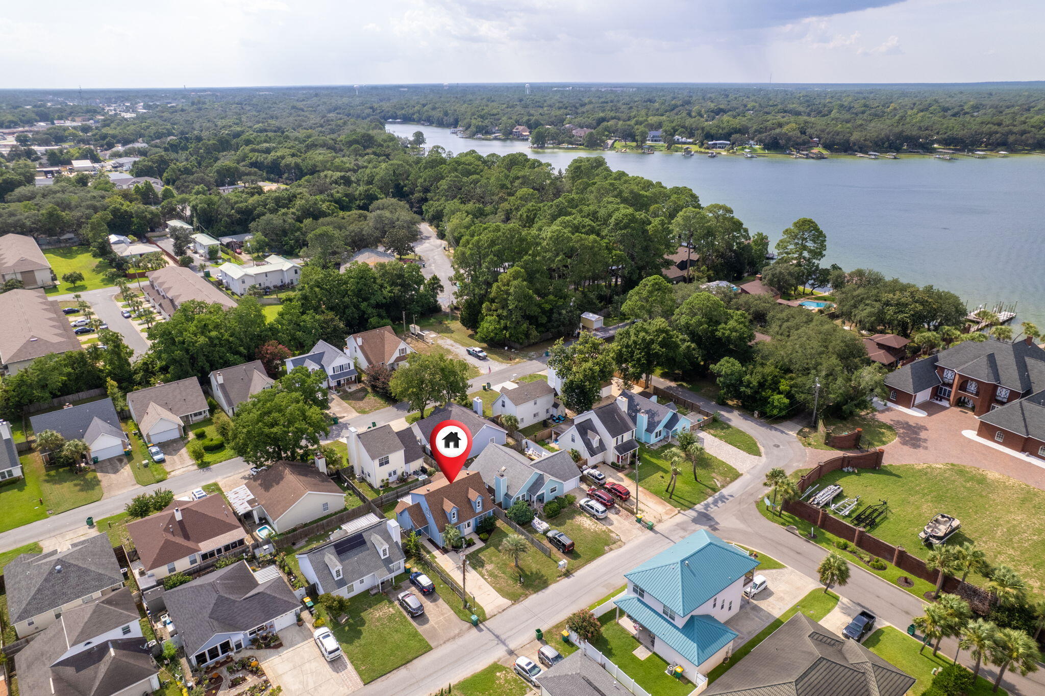 Active with a Kick-Out Clause | Professionally Staged 
Welcome to 150 Beach Drive, where fresh updates, smart design, and an unbeatable location come together to create an easy, move-in-ready lifestyle. This beautifully updated home has already done the work for you, featuring brand-new improvements throughout, including a new water heater, fresh interior and exterior paint, new Hardie board siding, new front and back doors, and replacement of both front-facing upstairs windows. Both bathrooms shine with remodeled showers, and for added peace of mind, the master bedroom and front living room window glass was replaced in Sept 2025. Location is a major win here just minutes from Eglin AFB and Hurlburt Field, making this an ideal choice for active-duty military and DOD personnel. Everyday essentials are close by with Publix right across the main road, plus highly regarded schools including Shalimar Elementary, Pryor Middle School, and Choctaw High School. Inside, the split-bedroom floor plan offers both comfort and functionality. The main-level primary suite provides a private retreat with dual step-in closets, ceiling fan, double vanity, and a tiled tub/shower combo. The kitchen blends style and efficiency with granite countertops, recessed lighting, a galley layout, and a convenient laundry closet, opening seamlessly to the dining area accented by crown molding and chair railing. Downstairs, enjoy tile flooring and abundant natural light, while upstairs features laminate wood flooring, two spacious bedrooms with ceiling fans, ample closet space, and extra attic storage. Step outside to a privacy-fenced backyard complete with a large storage shed perfect for tools, bikes, beach gear, or weekend projects. Stylish updates. Smart layout. Prime location.
Homes like this don't last long schedule your private showing today and see why 150 Beach Drive is such a standout.