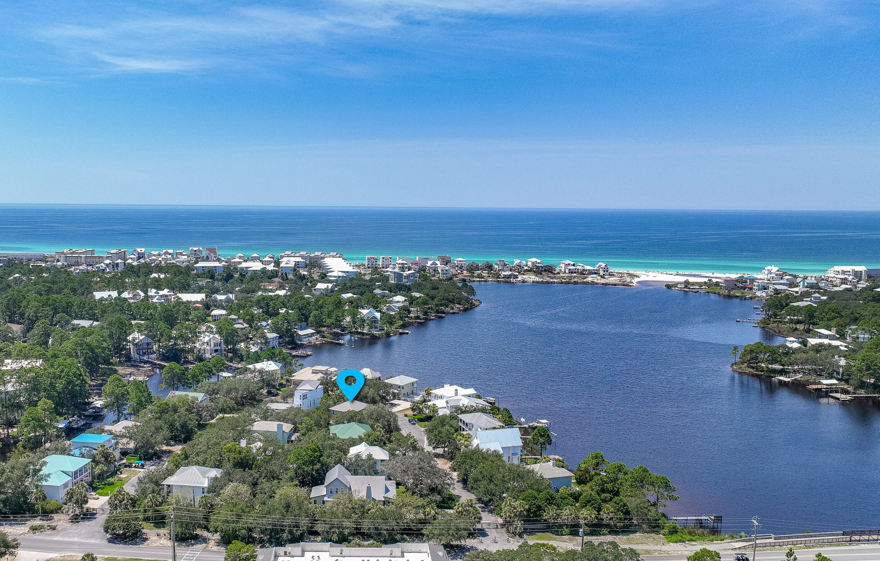 Prominently located on the south side of 30A discover coastal living at it's finest in this three bedroom, two & half bath home nestled within the exclusive gated community of Lakewood Pointe Estates. Breathtaking views of the Gulf of Mexico and Eastern Lake, a rare coastal dune lake. The first floor boasts an inviting open floor plan complemented by a spacious screened in porch. The large primary bedroom beckons with a covered porch providing a tranquil retreat on the second floor. A generously sized corner lot offers opportunity for a pool and additional square footage. For the avid boater you may park right out your door and launch minutes away at the public boat ramp on Eastern Lake. Homeowners and family will enjoy the close proximity to Greenway Park, the newest town center, featuring Wild Olives, Canopy Road Breakfast Cafe, Turbo Coffee, Local Cantina, Pecan Jacks, The Salty Butcher, local boutiques and access to the State Forest. If you are looking for a wonderful place to call home this could be the one!!
