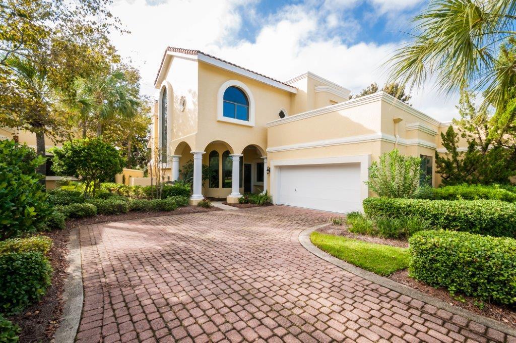 VIEWS, PRIVACY, SPACE--The Fountains, a gated enclave of 25 properties, convenient to The Village, tennis facility, marina. GOLF CART INCLUDED! Home has lake and Baytowne golf course view with an exceptional view from upstairs balcony. Kitchen, with dramatic curved wall of windows, has stainless steel Dacor microwave and stove in large kitchen island, Bosch dishwasher, Kitchen-Aide refrigerator. Other great features: walk-in pantry, hardwood flooring, built-in closets, gas fireplace, over-sized garage, ground floor bedroom and bath, large garage. Exterior recently painted with 7-year Elastomeric paint. Soaring great room ceiling and large windows are impressive. Fountains fees are $395/mo. SOA fees are $362.75/qtr. Transferable home warranty to 3/18. Buyer to confirm all information