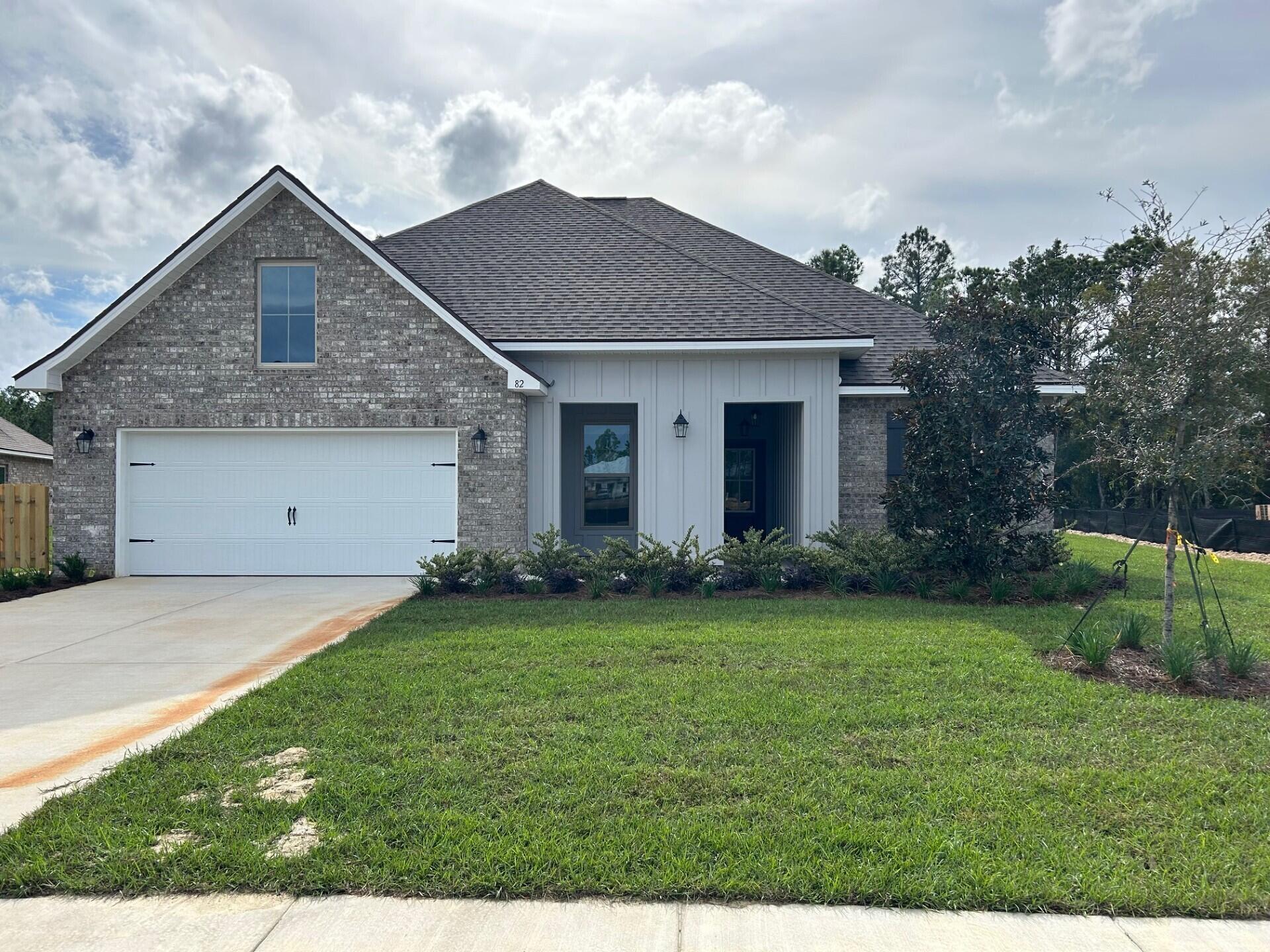 The HICKORY III G in Starburst at Hammock Bay community offers a 5BR, 3BA open design. Upgrades added (list attached).  
Features: double vanity, garden tub, separate custom tiled shower, and walk-in closet in the master suite, formal dining room, separate den, boot bench at garage entry, kitchen island, walk-in pantry, covered front/rear porch, recessed lighting, crown molding, framed mirrors in all baths, smart connect Wi-Fi thermostat, smoke/carbon monoxide detectors, landscaping package, architectural 30-year shingles, flood lights, and more!
Energy Efficient Features: water heater, kitchen appliance package, vinyl low E windows, and more! Energy Star Partner.