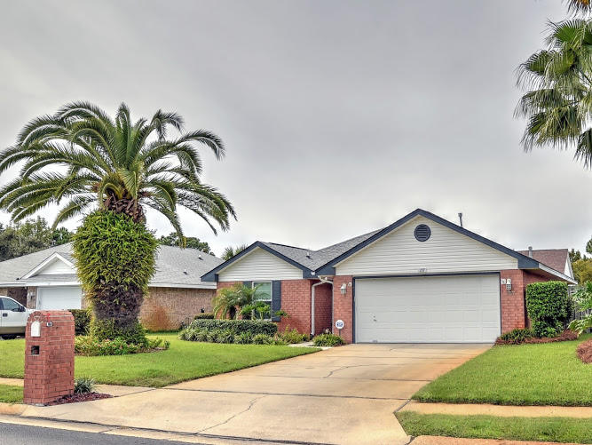 PRICED TO MOVE! Over 80k in seller upgrades on this all brick home! Want a GREAT location? This home is for you, UPDATED and move-in ready. Kitchen counter tops and master bath vanity are adult height. Within 1/4 mile of the Bayside subdivision are Silver Sands Premium Outlet stores, multiple restaurants, Winn-Dixie, CVS, nail and hair salons, dentist and veterinarian. Sacred Heart Hospital and medical facilities are less than 10 minutes away. For safety, there is a traffic light on US-98. Low HOA fee $66/month. The master bath, guest bath and kitchen have been gutted and updated with custom materials. Master bath is shower only with a frameless glass door and 7' shower head, 2 sink cultured marble vanity top and comfort height toilet. Guest bath has shower/soaking tub that is 18'' deep. single sink top. Comfort height toilet. Kitchen has custom wood beachy green wood cabinets. Granite counter tops, subway tiled backsplash, under counter lighting and is also plumbed for gas range. Main living area has engineered hardwood hickory flooring, updated base boards and door trim. All windows are hurricane rated with 2" faux wood blinds. All rooms have been painted, new carpet in MBR and office. Screened in patio with tile floor. New A/C in 2017. New gas hot water heater installed June 2019. Lush landscaping with lighting and palm trees. Transferrable termite bond in place! Bayside amenities include community pool, tennis, playground, picnic pavilion and deeded bay access with fishing pier.
