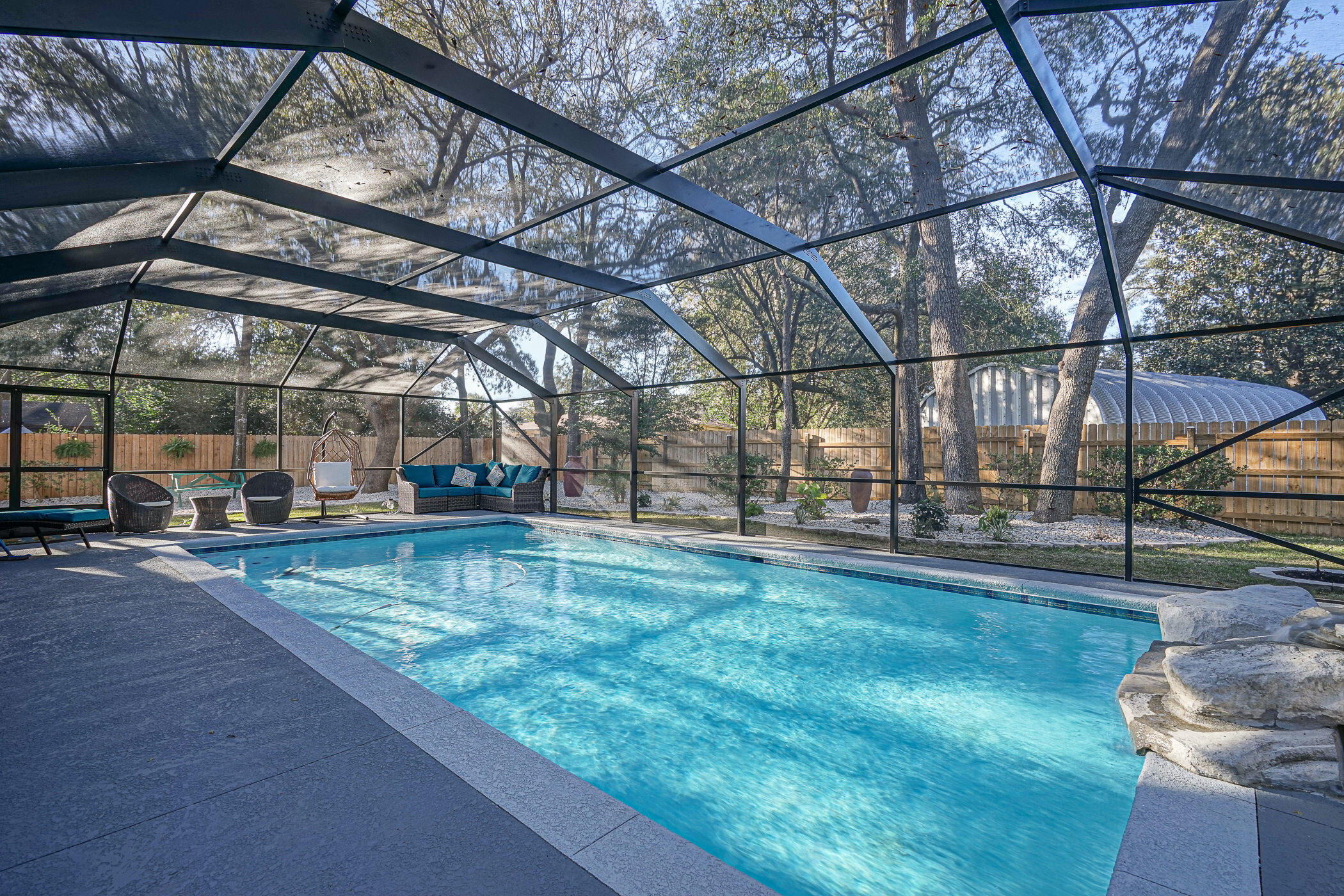 Dreams do come true! New oversized gunite pool with a waterfall and screen enclosure, sprawling yard, professionally landscaped with many areas to lounge, unwind and play sports. A newly remodeled, custom brick home with fireplace designed for entertaining. Open floor plan offering enough space for another bedroom. No expense spared on high ceilings, recessed lighting, the updated kitchen appliances plus plantation shutters and upgraded doors and windows. Luxurious master bathroom offers a freestanding tub and easy access shower of the latest tile. Over $100,000 spent on remodelization. Wind mitigation, WDO and home inspections completed; saving you hundreds. All repairs deemed necessary will be done. Home warranty to include pool coverage offered for peace of mind. Closing cost assistance