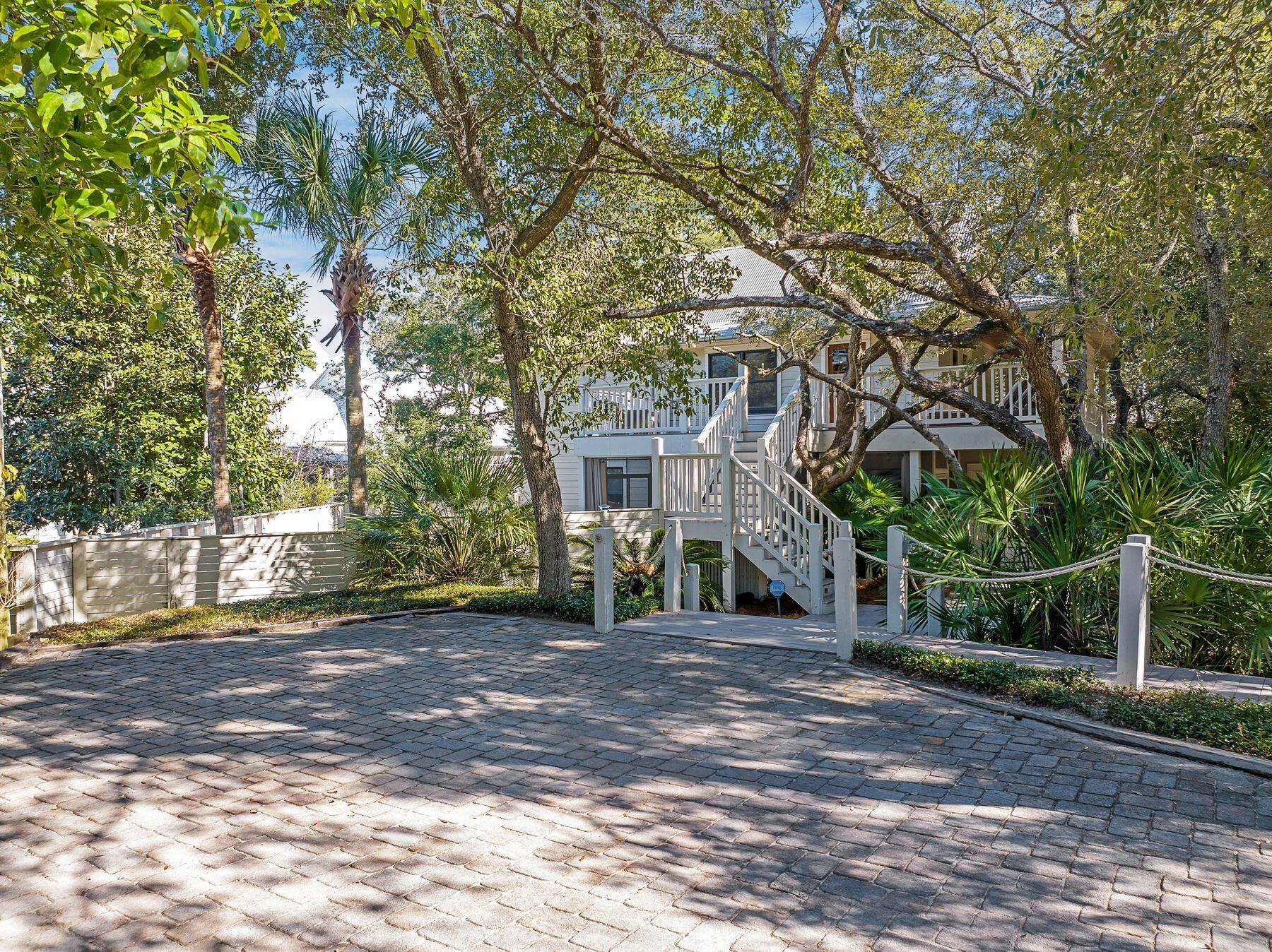 Welcome to Old Seagrove Beach and an estate sized lot of over 12,000 square feet with a 3 bedroom and 1 bunk room 2 bath cottage of 2,100 square feet with a great pool. 

Presenting the largest street frontage of any lot on Forest Street and indeed in Old Seagrove.   The current home sits stately and westerly on the lot leaving a sizable 46 foot by 125 foot remaining yard to the east for your imagination.

Opportunities for expansion abound including additional space or even a pickle ball court while you enjoy an elegant living area with a charming ceiling treatment that brings warmth to the space on the second level.

Overlooking the pool and yard is a stunning wrap around deck.