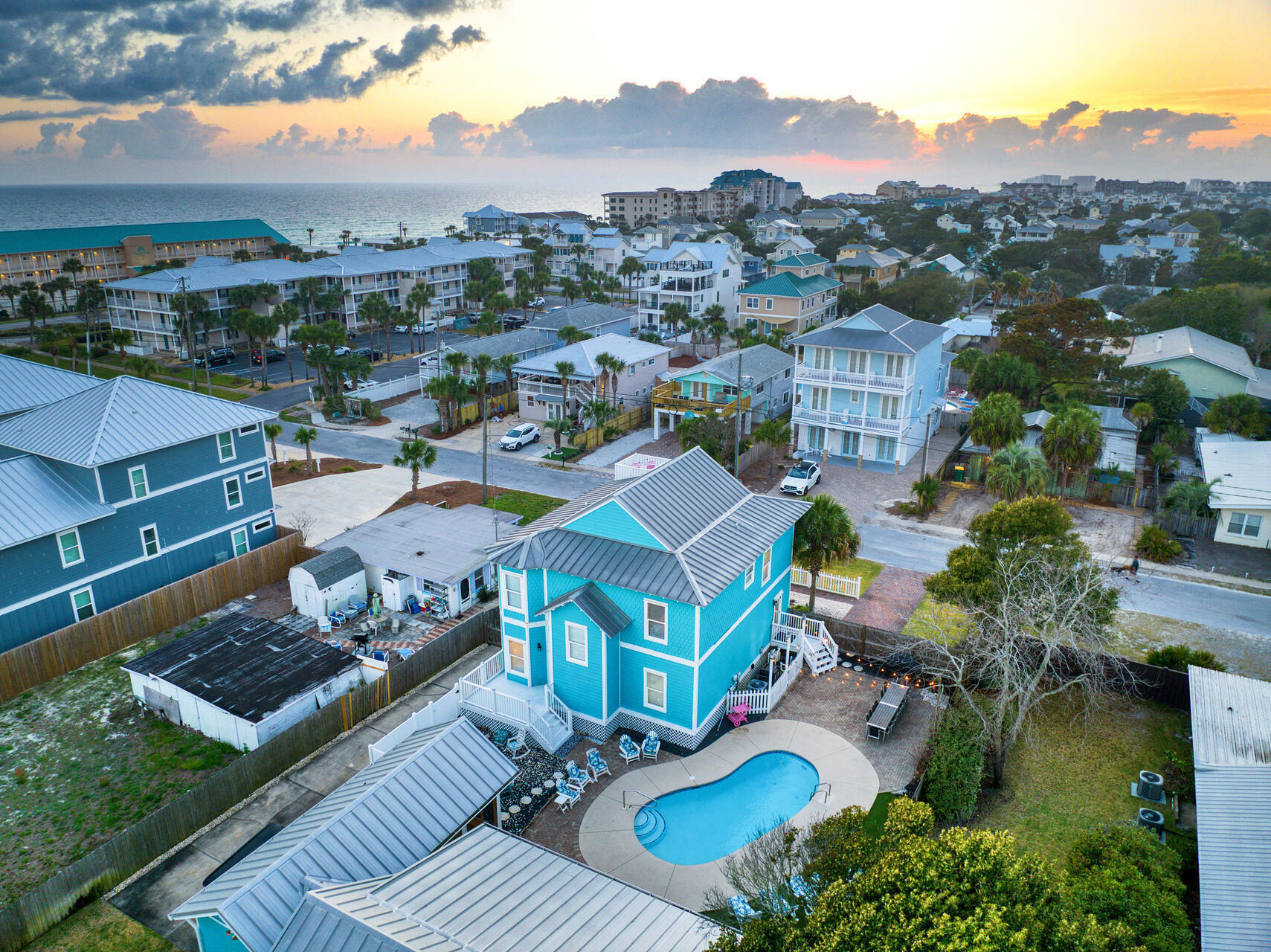Stunning Crystal Beach Rental Powerhouse - Steps to Destin's NEW Expansive Public Beach Access with Bathrooms & Boardwalk! NO HOA!
This is the beach investment everyone is watching. Located in the heart of highly desirable Crystal Beach, this 8BR/6.5BA coastal retreat sits on one of the largest lots in the neighborhood and is just a short stroll to the brand-new, expansive public beach access featuring bathrooms and a boardwalk, currently being developed by the City of Destin. This rare upgrade to the area makes this property even more valuable for both personal enjoyment and rental appeal.

The main home offers 6BR/4BA, while the luxurious 2BR/2.5BA cabana house creates the perfect setup for multiple families, large groups, or maximizing rental income. A true courtyard oasis sits between the two homes--complete with a private heated pool, oversized gas fire pit, brick-paver lounge and dining area, and a large screened-in porch overlooking it all. This is outdoor living at its finest.

Inside the main home, an open-concept living/dining/kitchen area welcomes you with abundant natural light from the bay windows. The kitchen features a spacious breakfast bar, stainless steel appliances, French-door refrigerator, and a gas range--ideal for hosting and entertaining.

Just steps to the Pompano Street beach access and the newly acquired large public beach, this location is about to become even more sought-after. With room to expand the guest house or add additional amenities, the upside potential is exceptional.

Plenty of parking. No HOA. Prime location. Massive lot. High-earning rental machine.

Opportunities like this don't sit long--secure your Crystal Beach investment before the new beach access opens and values climb. Reach out today to make this standout property yours.