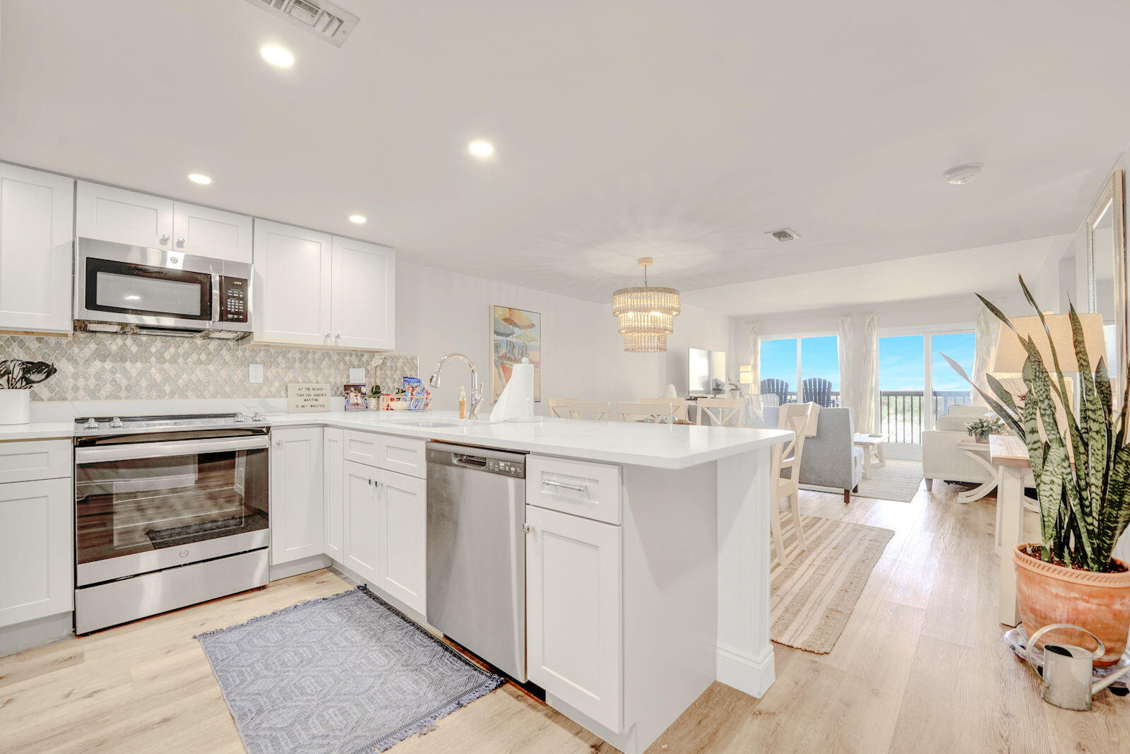 Experience the perfect blend of comfort, style, and convenience in this beautifully remodeled 2-bedroom mid-rise condo located in the highly sought-after low-density building at Pinnacle Port. Situated on the bottom floor, this residence offers unbeatable ease of access—step right out to the beach, pool, and all the resort amenities without ever needing an elevator. Inside, the unit has been thoughtfully updated and never rented with modern finishes throughout, featuring an open-concept main living area, a refreshed kitchen with sleek appliances, and upgraded baths. Large windows bring in natural light and offer peaceful views of the surrounding coastal landscape. Pinnacle Port is known for its unmatched blend of privacy and amenities, including two pools, direct beach access, tennis and pickleball courts, fitness facilities, a boat launch, and 24-hour gated security. With its low-density design and ideal ground-floor location, this condo delivers the rare combination of tranquility, convenience, and resort living on one of the quietest stretches of Panama City Beach with easy access to the restaurants and shops on 30A. Whether you're looking for a second home, an investment property, or a serene coastal retreat, this remodeled 2-bedroom unit is a standout opportunity at Pinnacle Port.