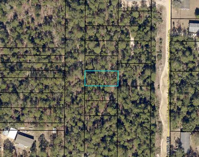 Come see this lot today! Quiet, peaceful neighborhood in the county, while still being just 15 minutes from town. Brick homes around.