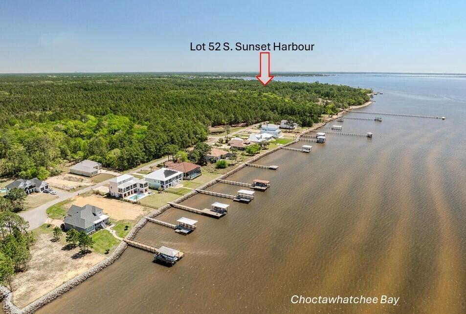 .57 Acre Lot! Do not miss this opportunity to build in one of Northwest Florida's most desired BAY FRONT neighborhoods! Enjoy LOW HOA, & LOW Taxes! This private lot is located on a cul de sac street in Bay Harbour, Freeport, Florida! Build your dream & enjoy your best life! Walk to the community dock, pier, boardwalk & tennis courts! Beautifully maintained, Bay Harbour is nestled into a 175-acre nature preserve. Amenities include the owner's boat/RV storage! Launch your kayak on the sandy beach! Just 20 minutes to 30A & the Beaches of South Walton County, this is THE place. You deserve the BEST of the Beach & the Bay. Enjoy services, shopping, dining & entertainment. Easy access to airports, military bases, I-10, and Hwy 98. AVAILABLE NOW!