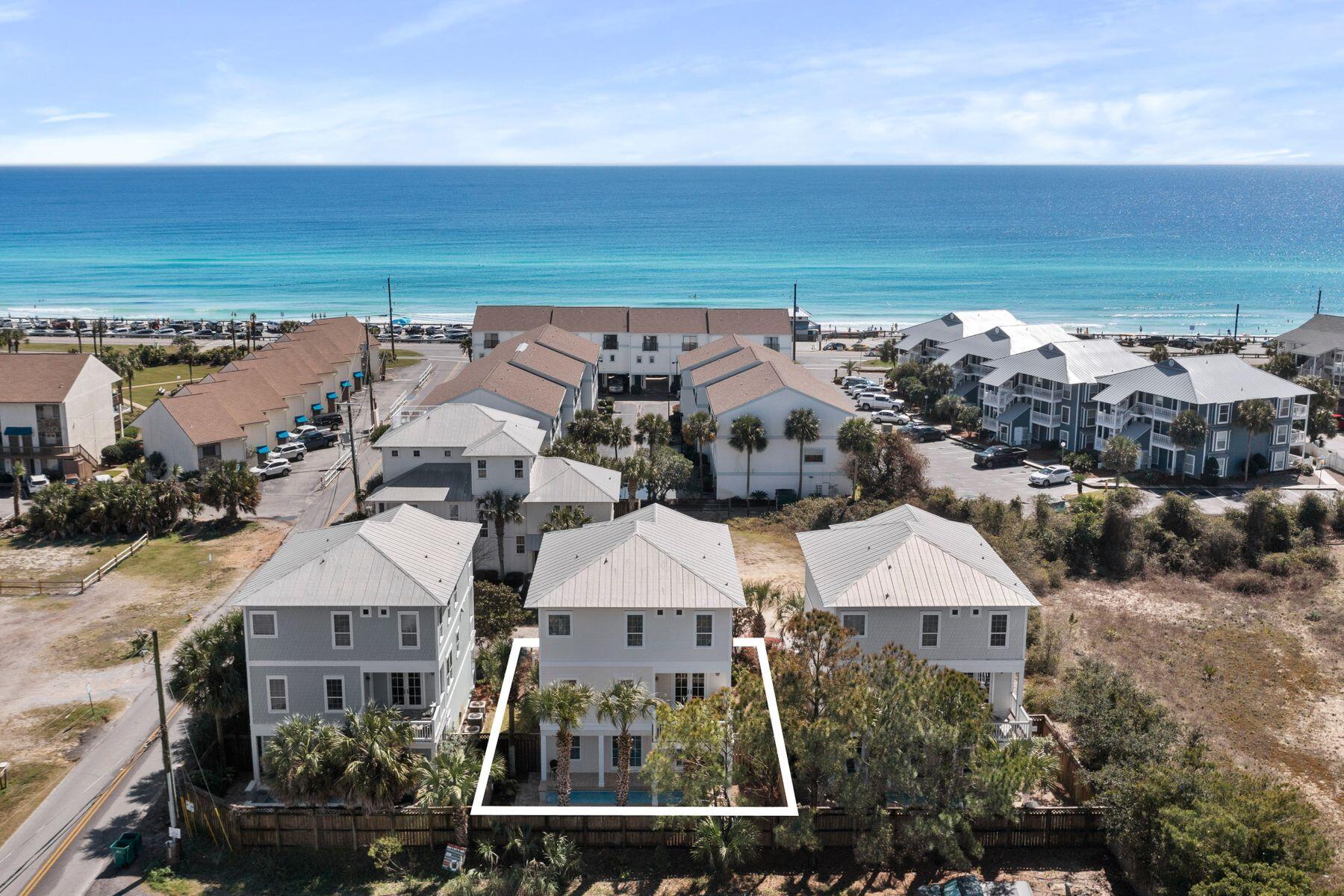 Experience refined coastal luxury in this completely updated, turn-key rental machine that's primely positioned within a 2 minute walk to the oversized beach access and famous Pompano Joes in Miramar Beach. With it's proximity to the beach, you'll feel the warmth of the Gulf of Mexico waves rolling onto the pure white sandy shoreline that makes this area special.  Plan on relaxing in style with your family as this home boasts 5 full bedrooms, 5 full baths, 1 half bath, a heated pool, and great outdoor space great for entertaining and private for retreating. With a fresh coat of paint with all new furnishings, this home is truly turn-key and ready to go with a full season of bookings already rented that will transfer to the new owner. 

The home layout is perfect for everyone in the family with two separate living areas, one living/game room that attaches to the outdoor living space & pool, and a wide open living and kitchen on the second floor for those that may want to get away from the action. High-end stainless appliances, granite counter tops, crown molding, solid hard wood floors throughout, fresh furnishings, and so much more make this a great find. This home is not in an HOA so you owe no extra dues and ease of ownership which make this an great rental.

Miramar beach has everything you'll need for a beach vacation and is sure to hold a special place in the heart of guests and owners alike.  Within close proximity are many first-class restaurant establishments, premium outlet malls, golf courses, sporting activities, and of course the famous scenic 98 corridor for some of the nicest walks you'll be able to take!