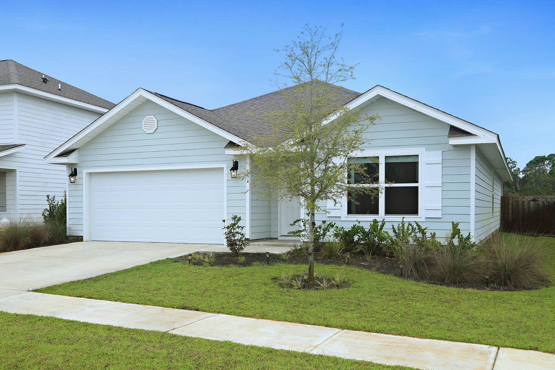 Wonderful curb appeal in this 1 year old, 4 bed, 2 Bath home with a 2 car garage. In addition, enjoy the beautiful sunsets in this fully fenced backyard that backs up to one of many ponds within Hammock Bay. This is a split bedroom design with the additional rooms located just off the foyer. The home is also equipped with smart home technology, Internet fiber optic lines and well irrigation. Mill Cottages at Hammock Bay is close to the amenities and endless walking paths! Amenities include three swimming pools, owner's club, 24/7 state of the art fitness facility, outdoor amphitheatre, tennis, basketball, disc course, 60 acre sports complex with baseball diamonds and concession stand, soccer fields, sand volleyball, splash pad, batting cages, and more. Hammock Bay enjoys a robust Events Committee which plans many holiday celebrations and festivals throughout the year! Come see why Hammock Bay is the best neighborhood in Northwest FL! Buyer to verify all square footage and information important to them.