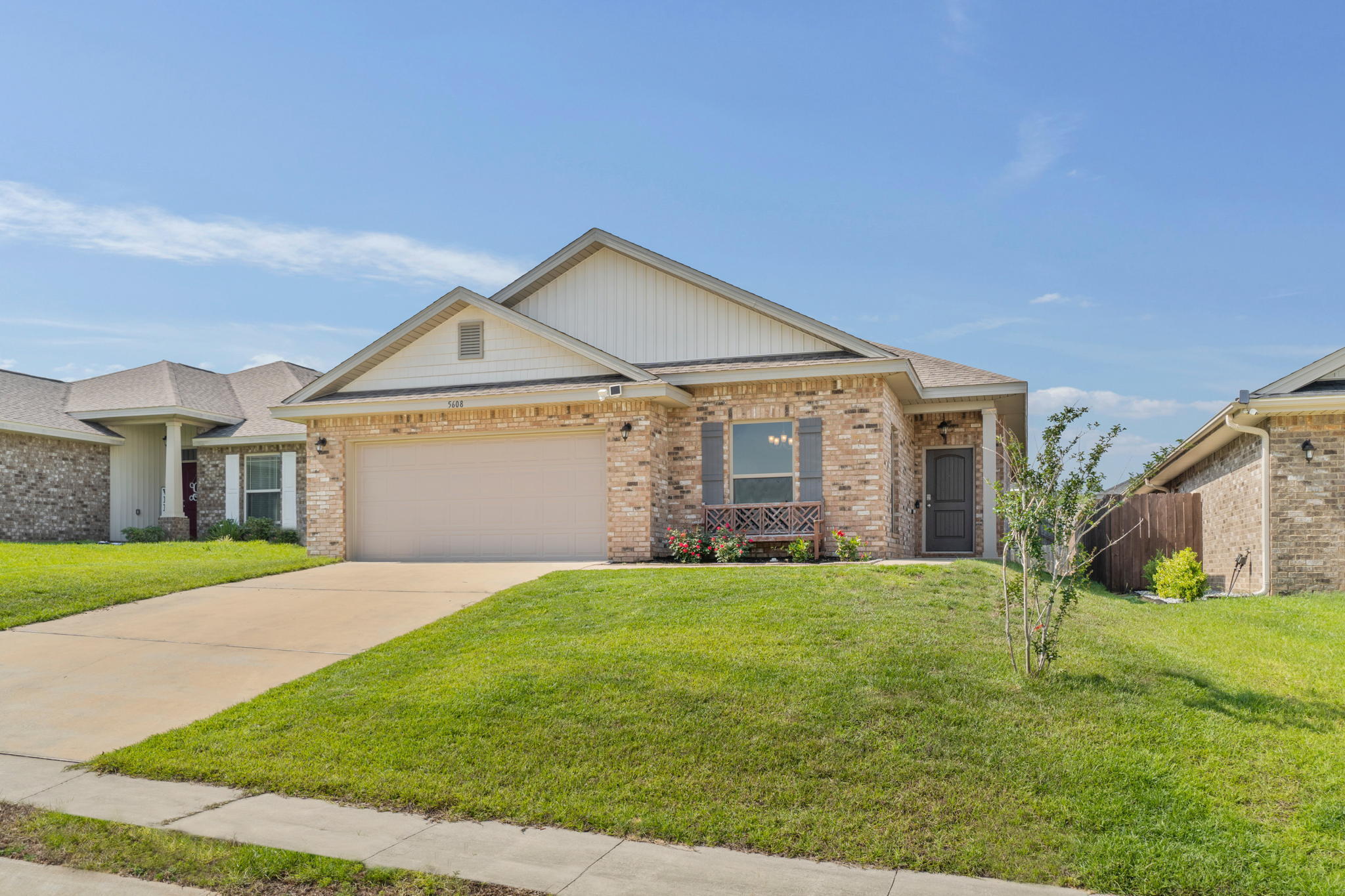 *Back on the Market, Buyers lost financing* Welcome to Bon View where you'll find this practically brand new 3 bedroom/2 bath home conveniently located minutes from Hwy 90 and I-10 in Milton on a cul-de-sac street with underground utilities! This lovely all brick home has a split bedroom floor plan that features a spacious open living room that adjoins the kitchen with an eat-at bar and laminate flooring extending throughout. You'll love the shaker style cabinets, granite countertops, and tasteful backsplash in the kitchen, along with deluxe appliances with built-in microwave, multi-cycle dishwasher, garbage disposal, pantry, and LED recessed lighting in kitchen along with an eat in kitchen space. The large master bedroom has plenty of room for your master bedroom suite and has a custom  built barn door into the bathroom where you'll find double vanities, an oversized soaking tub, a separate shower with glass door enclosure, and TWO walk in closets. On the other side of the home another custom built barn door opens to a hallway where you'll find the interior laundry room, two great sized bedrooms with ample closet space, and a full bathroom with an upgraded vanity and matching framed mirror. Additionally you'll find a covered back patio to enjoy, a double garage, and storm shutter window protection for peace of mind.