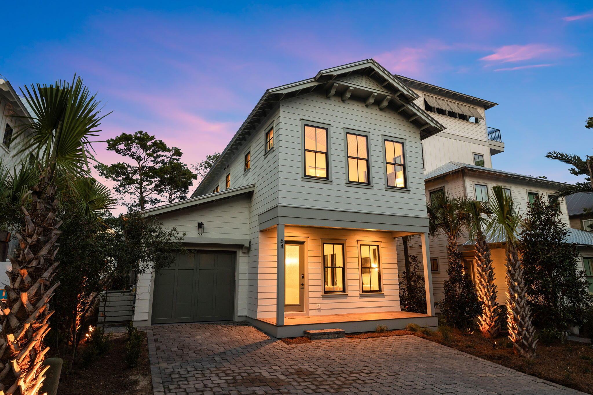 Welcome to 64 Grande Pointe Drive, a stunning new construction home nestled in the highly sought-after Grande Pointe neighborhood of Inlet Beach. This exceptional property offers an enviable coastal lifestyle, surrounded by the charm of Inlet Beach and a plethora of delightful dining and shopping options. With the added convenience of the new pedestrian underpass, accessing the renowned 30A is a breeze.
Boasting 4 bedrooms and 3.5 baths, including a luxurious master suite, this home provides a serene haven for families or those seeking a beachside retreat.
Step inside to discover the meticulous attention to detail, evident in the beautiful stained pine accent ceilings that lend a touch of rustic elegance to the living areas. The gourmet kitchen is a chef's dream, equipped with top-of-the-line KitchenAid appliances, custom cabinets, and stylish black accent hardware that perfectly complements the contemporary design. Hardwood floors add a touch of sophistication throughout, ensuring a seamless flow from room to room.
Perfectly accommodating large families or groups, this home features built-in bunk beds, comfortably sleeping up to 10 people. The bathrooms exude luxury, showcasing custom cabinets and premium finishes, creating a spa-like ambiance for relaxation and rejuvenation.
Step outside onto the covered balcony, ideal for savoring the coastal breezes and enjoying al fresco dining. For those who love to grill, an outdoor barbecue area awaits, promising unforgettable gatherings and delicious meals. As part of the Grande Pointe neighborhood, residents have exclusive access to the serene community pool and picturesque lake, perfect for leisurely strolls and moments of tranquility.

Don't miss the chance to make this extraordinary new construction home in the Grande Pointe neighborhood your own. Embrace the coastal living you've always dreamed of and seize this exceptional opportunity today.