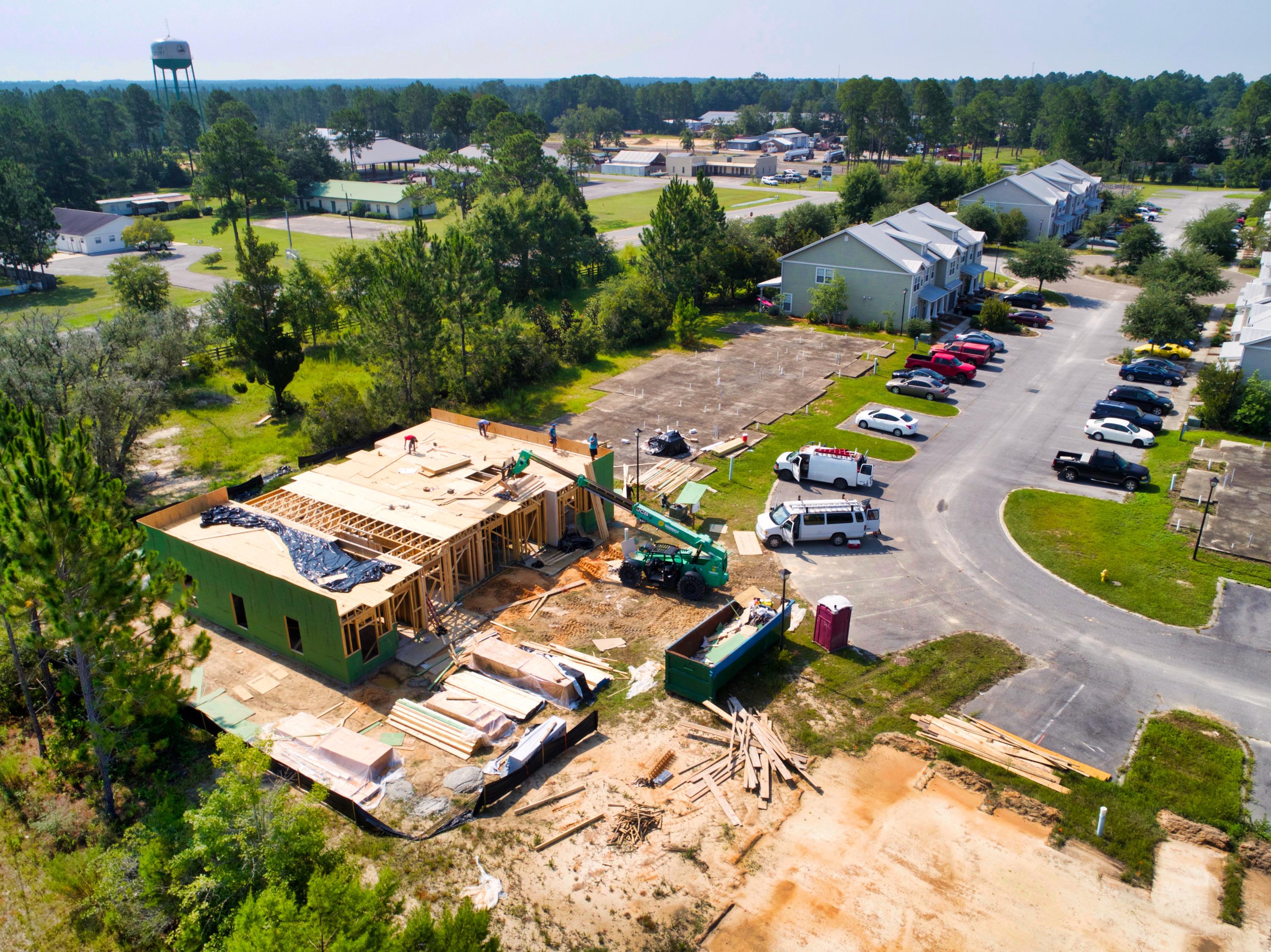 BRAND NEW 4PLEX!! The Verandas at Freeport are continuing their buildout of this beautiful townhome development. This is a great opportunity for you to own a piece of this brand new multi-family townhome development. This four-plex unit consists of (2) 3BD/2.5BA units. (2) 2BD/2.5BA units. These units will include Metal Roofing, Hardie Board Siding, Engineered Vinyl flooring throughout the house, Stainless Steel appliances, Granite countertops, 14 Seer air conditioner units, Open Floor-Plans, Craftsmen-style trim and much more. These units will make for a great Investment opportunity. Freeport is consistently growing and is not showing signs of slowing down anytime soon. Don't miss your chance to own your very own 4-Plex at The Verandas at Freeport!
