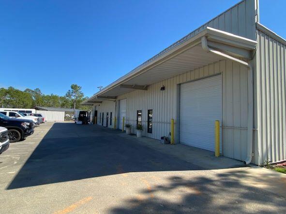2303 Highway US 98, Santa Rosa Beach is zoned with hard-to-find light industrial.
The building was built in 2016 and sits on .74 acres. It consists of 3 bays totaling 6050 sq. ft. 
The 3 bays (2000 sq. ft. each) are heated and cooled with Flex office/warehouse space. Bay A is currently utilized as a 2000 sq. ft. warehouse with 1 bathroom. Bay B consists of 1000 sq. ft. of finished space, including large kitchen, dining area, office space and bathroom with additional 1000 sq. ft. warehouse space. Bay C consists of lobby, 6 offices, kitchen, bathroom, and warehouse space. Flexible cap rates.