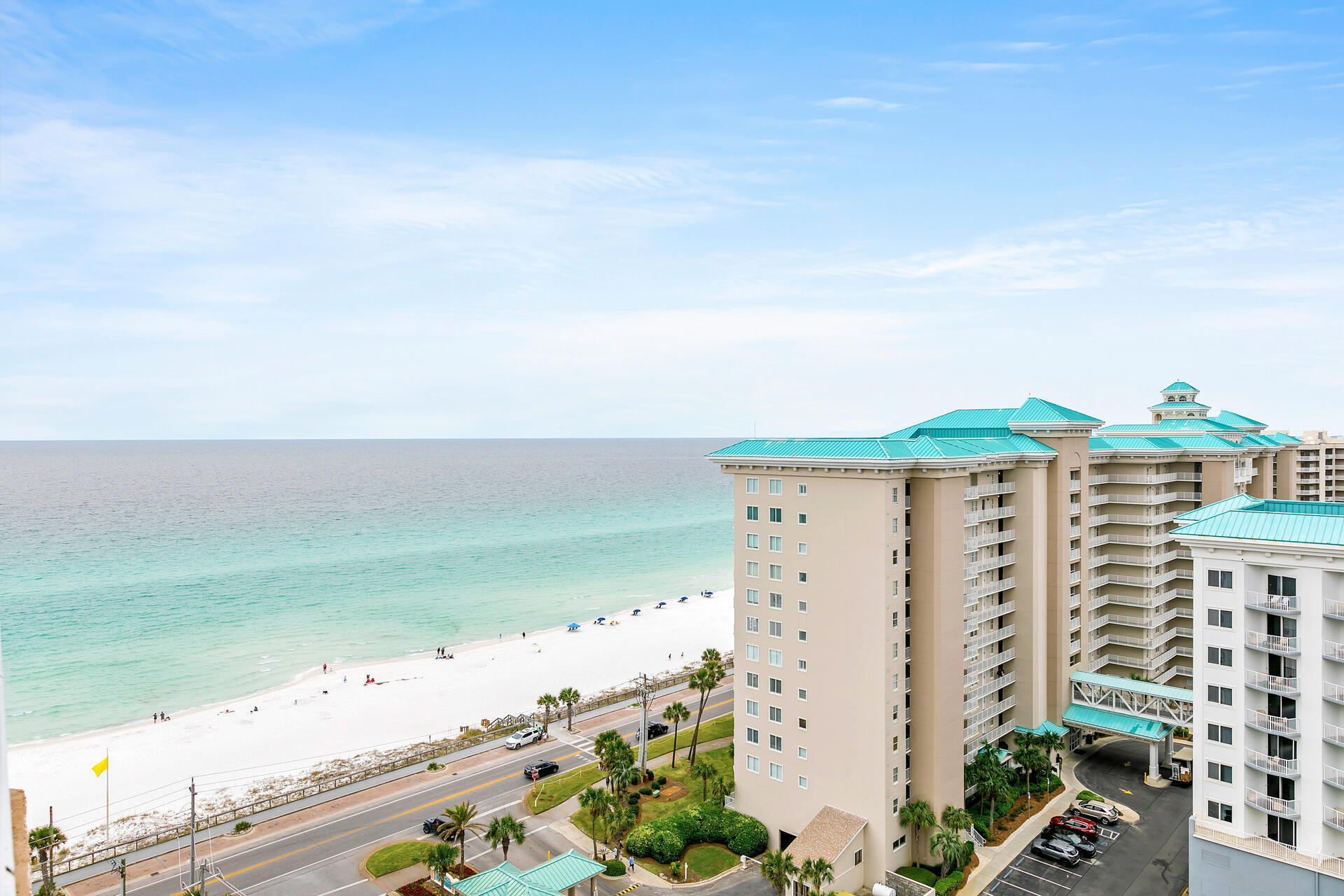 A luxurious mostly furnished condo with exhilarating sunset views of the Gulf of Mexico all the way to the Harbor and the Bay. Fireworks can be enjoyed weekly from the wraparound balcony. An easy beach skywalk from the condo to the beach leads you to the crystal white sand in just minutes. Make family memories and cash in on vacation rentals. Many restaurants, bars, and stores are nearby  via golf cart ride including the Silver Sands Outlet Mall. A fabulous outdoor concert venue is close by as well. This condo has 2 lock out  sections that can be rented separately for a variety of configurations. The condo is nicely updated with granite, stainless steel appliances, travertine tile, newly tiled bathrooms, new furnishings including all beds with adjustable motion, doors and hardware . Amenities include tennis, pickle-ball, basketball courts, fitness center, hot tub, swimming and kiddie pools, Royal Palm Grill restaurant and Beach Bar as well as a Spa and Hair salon. Two covered owner parking spaces are included, as well as 1 beach set up which includes 2 lounge chairs and an umbrella. All located on Scenic Gulf Drive -  a popular bike/walking path with many fun attractions and places to meet friends and family.