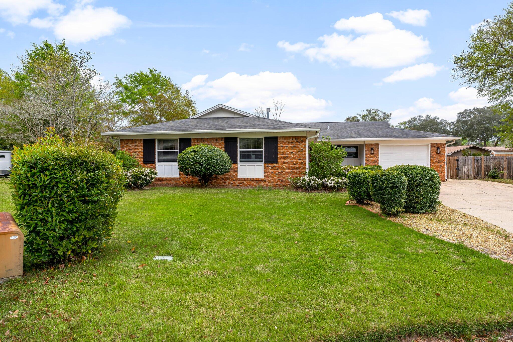 Welcome to 207 Island Lane, where modern updates meet laid-back Florida living! Tucked away at the end of a cul-de-sac, this beautifully remodeled 4-bedroom, 2-bath brick home offers over 2,100 square feet of stylish comfort—plus a backyard built for entertaining.

Step inside to find a bright, open layout with 9-foot ceilings, luxury vinyl plank flooring, and bright paint throughout. The kitchen is a true showstopper with White Shaker soft-close cabinetry, Carrara quartz countertops, and a full stainless steel appliance suite. Recessed lighting and updated fixtures add just the right touch of modern charm.

Outside, your private oasis awaits! The owners have added lush sod, a covered patio for year-round enjoyment, and an above-ground pool perfect for cooling in the Summer. Minutes from Eglin AFB, top-rated schools, parks, shopping, and dining, this move-in ready gem is the perfect blend of style, space, and location. Don't miss your chance to own one of the most polished homes in the neighborhood!