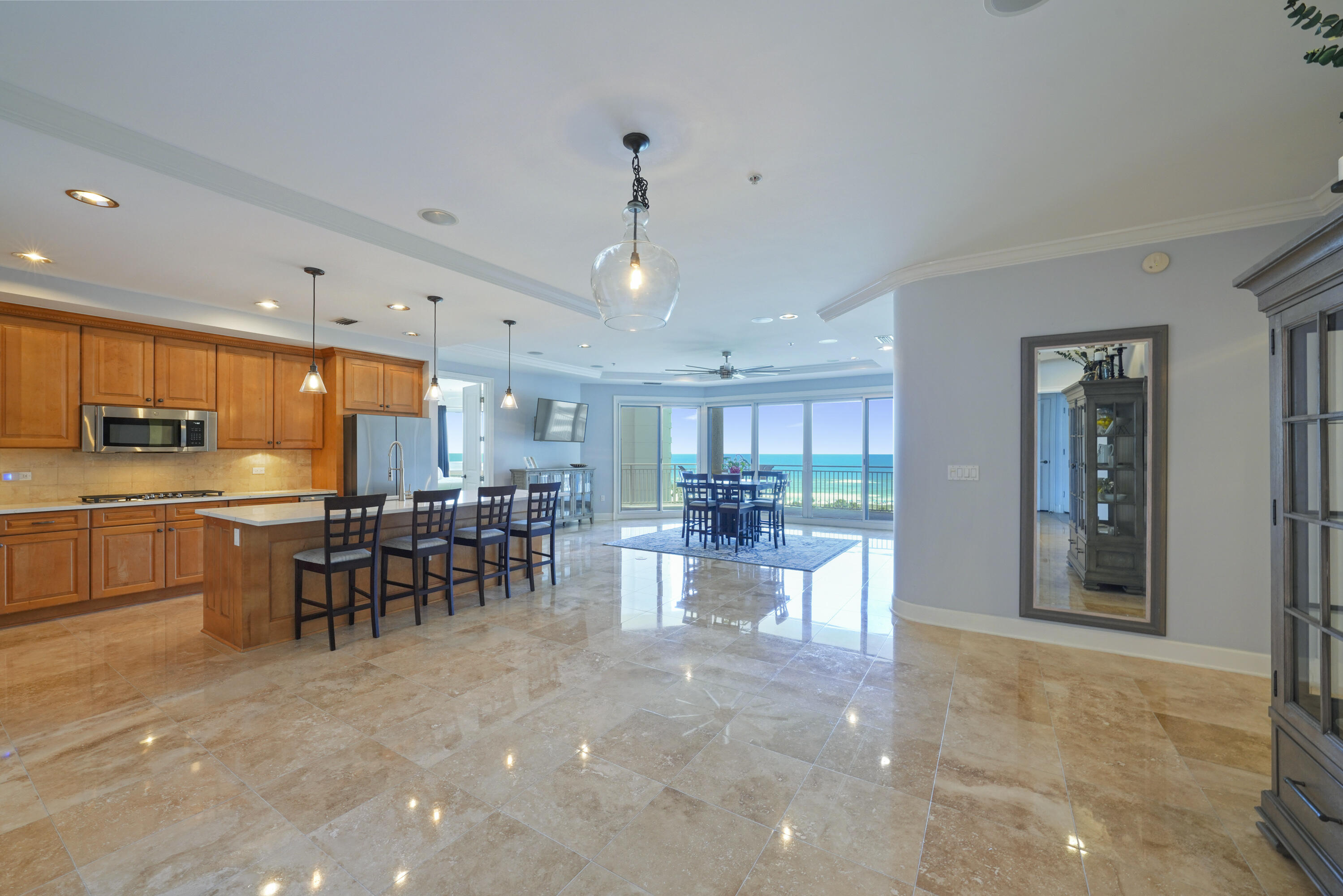 Experience the ultimate beachfront lifestyle in this exquisite, rental restricted, 3 bedroom, 3 bathroom condo in the heart of Miramar Beach. This stunning condo boasts 2,333 sq. ft of living space with breathtaking views of the Gulf of Mexico and offers unparalleled luxury and comfort. This Villa in Grand Dunes is well maintained and perfectly located on the 4th floor of Grand Dunes Il, giving it an 6th floor elevation and the views are fantastic! It will convey semi-furnished with some exclusions of personal items. As you enter the condo, you will be greeted by an open-concept living space, which is perfect for entertaining guests. The living area features floor-to-ceiling windows that let in plenty of natural light, and offer panoramic views of the emerald green waters of the Gulf. This unit offers: private entry foyer, flush mount speakers that are independently remote controlled in the Living Area, Primary Suite, and Gulf Front Suite.  Other features include: honed sealed and polished travertine flooring in private foyer, living areas, kitchen, hallways and baths, 9.5' ceilings, ''Super Quiet'' interior.  This beautiful Villa's HVAC Handler was replaced in 2023 and the Heat Pump Condenser was replaced in 2018 which has a 10 year warranty, and the Hot Water Heater is 6 years old.

The gourmet kitchen is a chef's dream with stainless steel appliances that include: GE 5 burner natural gas cooktop (replaced in 2024), Samsung "Twin Cooling Plus" refrigerator (replaced 2024), GE Profile double ovens and a dishwasher (replaced in 2024).  All custom quartz countertops in the kitchen and baths, which includes all new sinks and plumbing fixtures. The Primary Suite offers: "His & Hers" walk-in closets, trayed and coffered ceilings, and a sitting area. The Primary bath offers: dual quart vanities with soft-close drawers, a separate dual head shower, a spa-like jetted soaking tub with travertine surround, and a separate water closet. 

Step out onto the balcony and absorb the breathtaking views of the Gulf. This is an 11' deep Gulf front balcony with over 350 sq. ft of space with a natural gas built-in stainless steel grill (updated 2024).

This luxury condo is located in one of the most sought-after communities in Miramar Beach, with world-class amenities such as a fitness center, a heated swimming pool, and a hot tub. Grand Dunes
also offers direct beach access, so you can easily stroll down to the white sand beaches and emerald green waters of the Gulf.

Grand Dunes offers: "Super Quiet Interiors", 24 hour security, gated entry, lush landscaping, 3 levels of gated underground parking for owners, grand lobby, semi-private elevators leading into your private foyer, private heated pool & hot tub, Owner's Lounge with Gulf front Fitness Room, Over-flow suites for guests, 200' of deeded beach, serene streams, majestic waterfall and a Lagoon Style Gulf front pool area with Hot Tub shared by both buildings and Beach Service.

Grand Dunes is the Emerald Coast's Most Desired Rental Restricted Beachfront Development!

Call us today to schedule your private viewing of this gorgeous Villa!