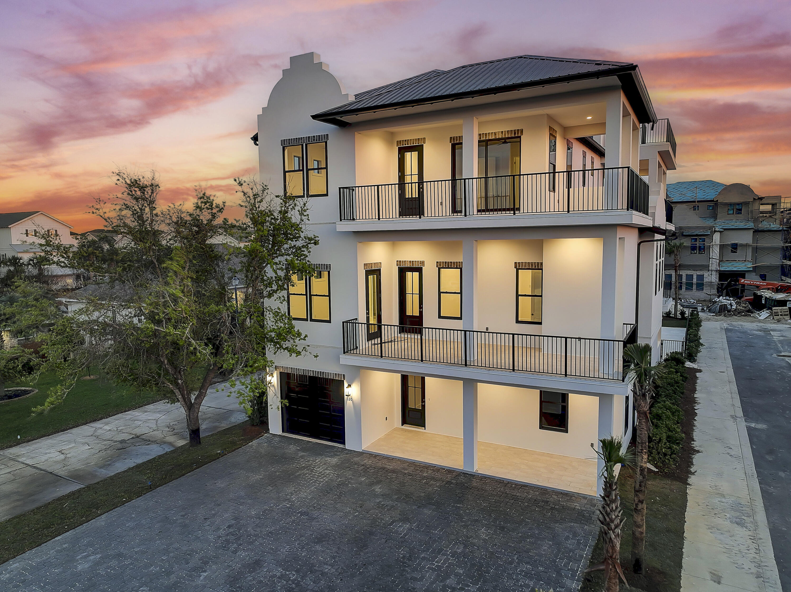 Brand-new build primely located just off Scenic Highway 98 with beach access next to Pompano Joe's. This grand Emerald Coast home has over 5600 square feet that spans over three levels and boasts 9 bedrooms and 9.5 baths.

This Coastal Charmer floor plan is thoughtfully designed perfect for large families, a vacation rental or even a second home. The first floor contains two full bedrooms, a bunk room with an open living room and game room. You can reach the second or third level by stairs or elevator. Located on the second level, the main living area is accented with striking sliding doors leading out to a large covered balcony overlooking your private pool. The adjoining kitchen features a luxury appliance suite and ample cabinetry space, an oversized island in addition to a walk-in pantry. A separate powder room and bunk area are also found on the second floor. Two full bedrooms have a beautiful front balcony view.

The third floor is complete with four full bedrooms, one of which has a front balcony view and the other overlooking the pool wrapping around the side of the house. At the end of this balcony is a spiral stair case that leads to the fourth floor rooftop observation deck with panoramic views. 
With rental projections starting at $327k, you don't want to miss out on this opportunity! This property is to be sold unfurnished.