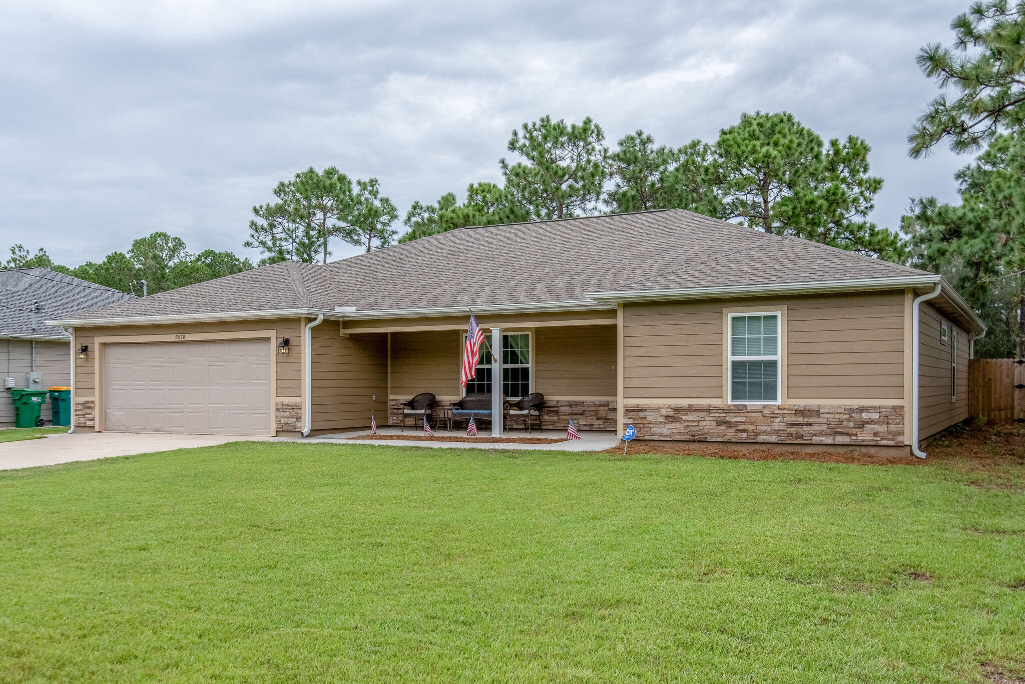 Nearly new 4 bed/2 bath split floor plan home. Large, open  kitchen with Espresso custom staggered cabinets, crown molding and beautiful granite counter tops features an under mount sink and oil rubbed bronze faucet, wine fridge under the kitchen island and open flow to the eat in area and great room. 20 x 20 tile in the main living area, laundry and all wet areas. Large Master with trey ceiling & crown molding. Master bath offers a open walk in tiled shower, granite double  vanity, oil rubbed bronze fixtures, and huge walk in closet. Front guest bedroom is 15 X 13, and other bedrooms are a good size all with large closets and ceiling fans. Custom Levelor blinds throughout. May accept a dog with prior approval and $400 non-refundable pet fee. Call for an appointment TODAY!