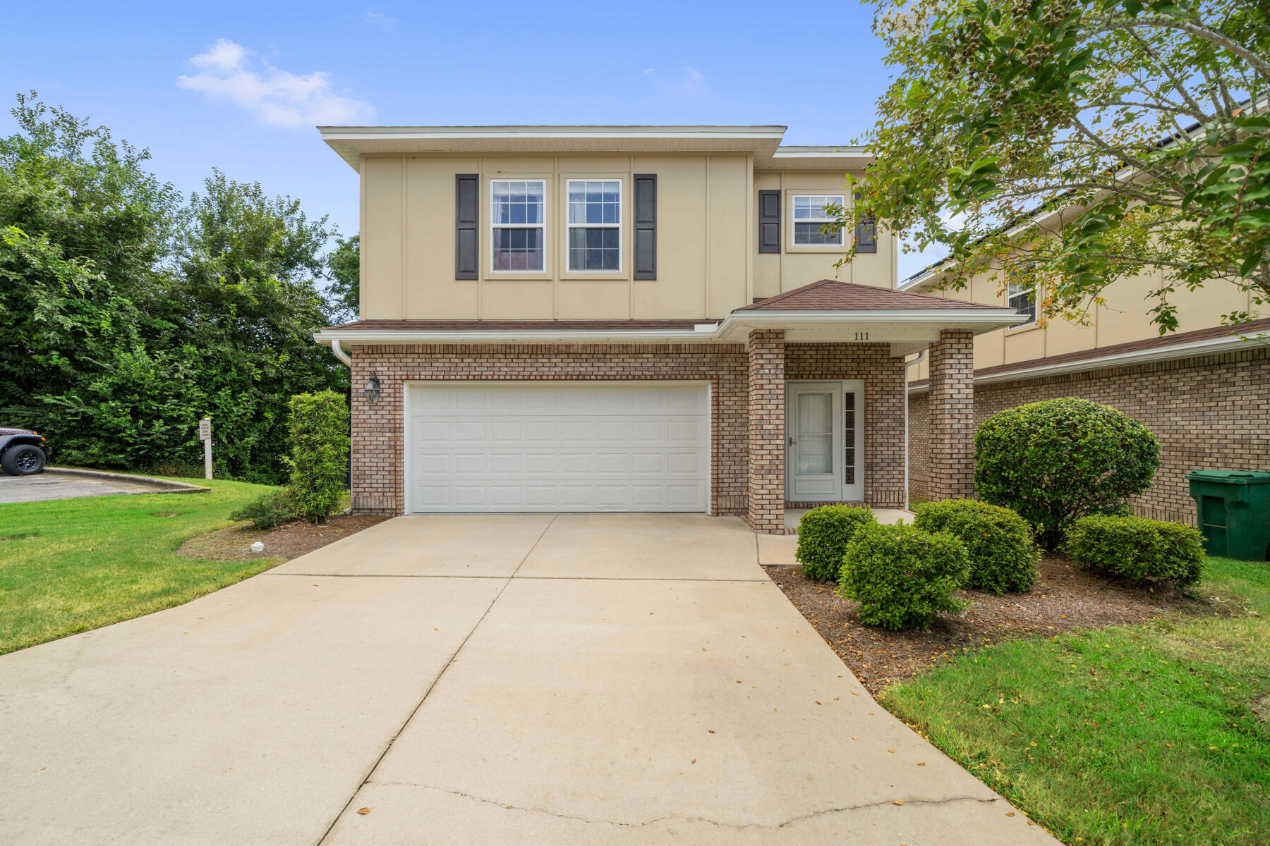 Welcome to 111 Big Oaks Lane! This well-maintained, 4-bedroom, 2.5-bath, and 2-car garage home is located in Traditions at Walton Oaks—an easy, low-maintenance subdivision in the heart of Niceville!

The open floor plan on the main floor is perfect for entertaining, whether you're hosting friends or enjoying cozy family gatherings. The kitchen offers plenty of cabinet space, sleek stainless steel appliances, and granite countertops, all while overlooking the living room and dining area. Step outside to your screened-in back deck and relax in the covered patio area with ceiling fans—ideal for unwinding year-round.

All four bedrooms are conveniently located on the second floor, providing privacy and space. The spacious master bedroom is a true retreat, featuring a large walk-in closet and a well-appointed master bath complete with a soaking tub, separate shower, and a private water closet. The remaining three bedrooms share a guest bathroom with double vanity sinks. The spacious laundry room is perfectly situated near the bedrooms for easy access and includes cabinets for extra storage and a utility sink!

This home sits on the largest, fenced-in lot in the neighborhood and backs up to a serene tree line. Stroll over to the community gazebo or explore the Turkey Creek Nature Trail right next door. Just 3 miles to Eglin AFB, close to shopping, restaurants, parks, and a short drive to beautiful Destin beaches, this home is truly a can't-miss opportunity!