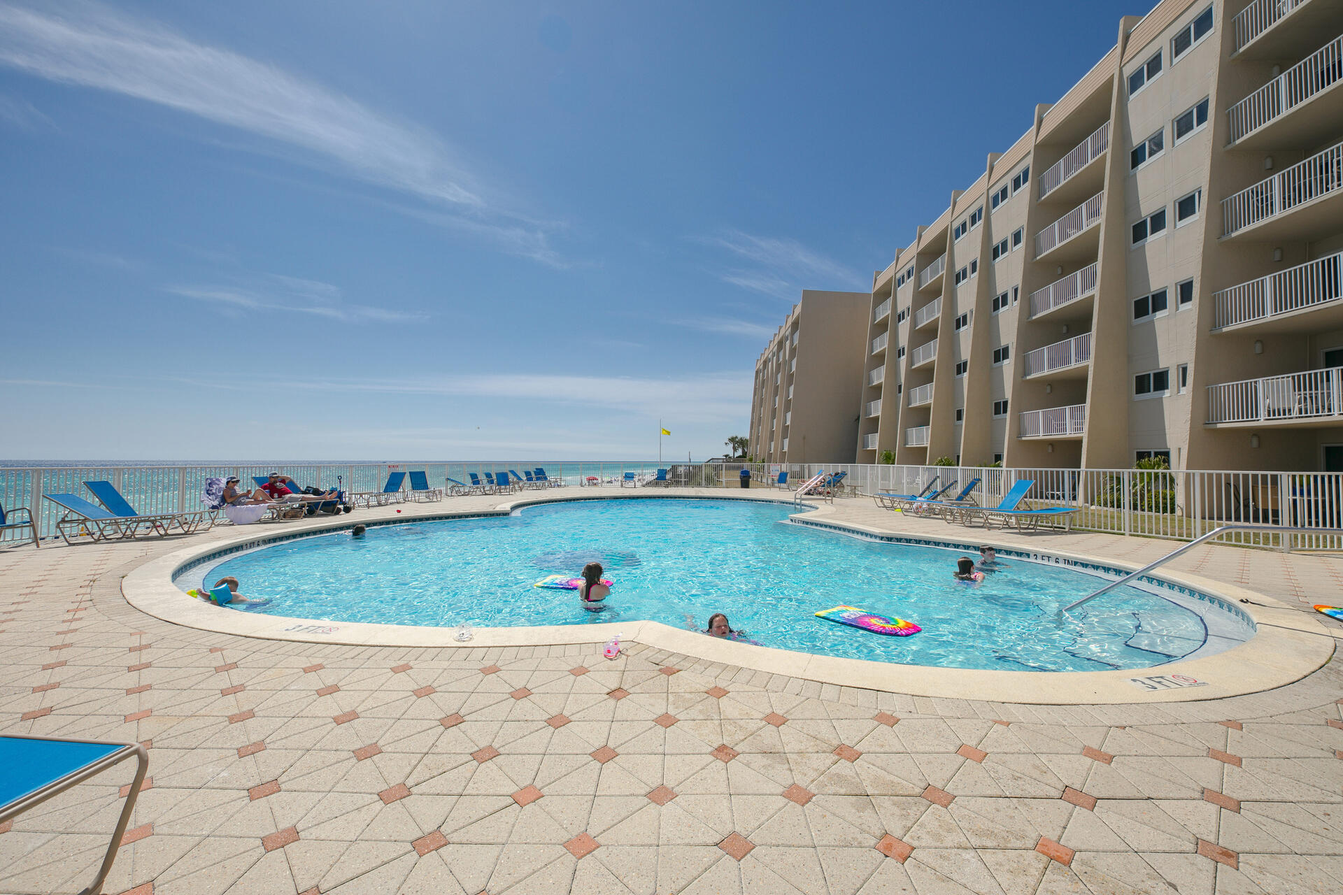 This fabulous walk in level condo has a big view of the Gulf of Mexico. Beautifully updated kitchen has grantie counters, new cabinets, and stainless appliances.  The bathrooms are also updated with stylish vanities. Located on the popular Scenic 98 walking/bike path with many fun restaurants and attractions in the area. Great amenities include, 600' feet of beach front, gulf front pool and hot tub, tennis , shuffle board, fitness center and more. Easy in and out with no stairs or elevators needed. Make family vacation memories and you can also cash in on vacation rentals.