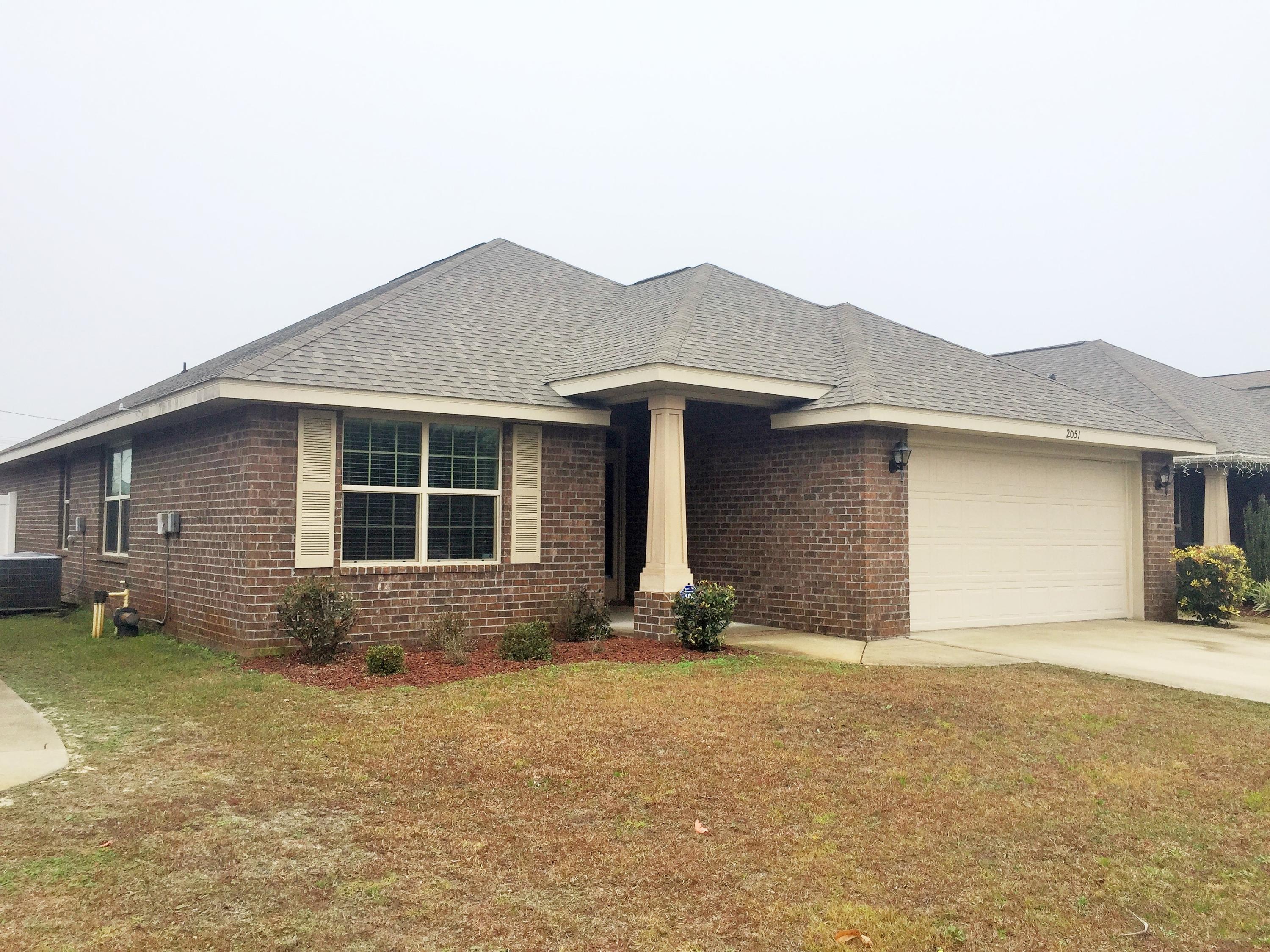 Location-Location-Location!!! This beautiful 4/2 brick home is in Move-In condition... ONLY 5 years old! Freshly Painted interior, Tile Flooring and Granite counter-tops in Kitchen and Baths. Spacious Kitchen, separate dinning area. The Great Room Offers Vaulted Ceilings, Plant Ledges The Master Suite has Vaulted Ceilings and a Spacious Bath Complete with Large Separate Shower and oversized Tub, Double Vanity and Large Walk-In Closet. Fenced Backyard with covered Patio... Fountainview Subdivision offers a Community Pool for Owners and quick access to Navarre Beach, Shopping and Schools... Also convenient to Hulrburt Field..