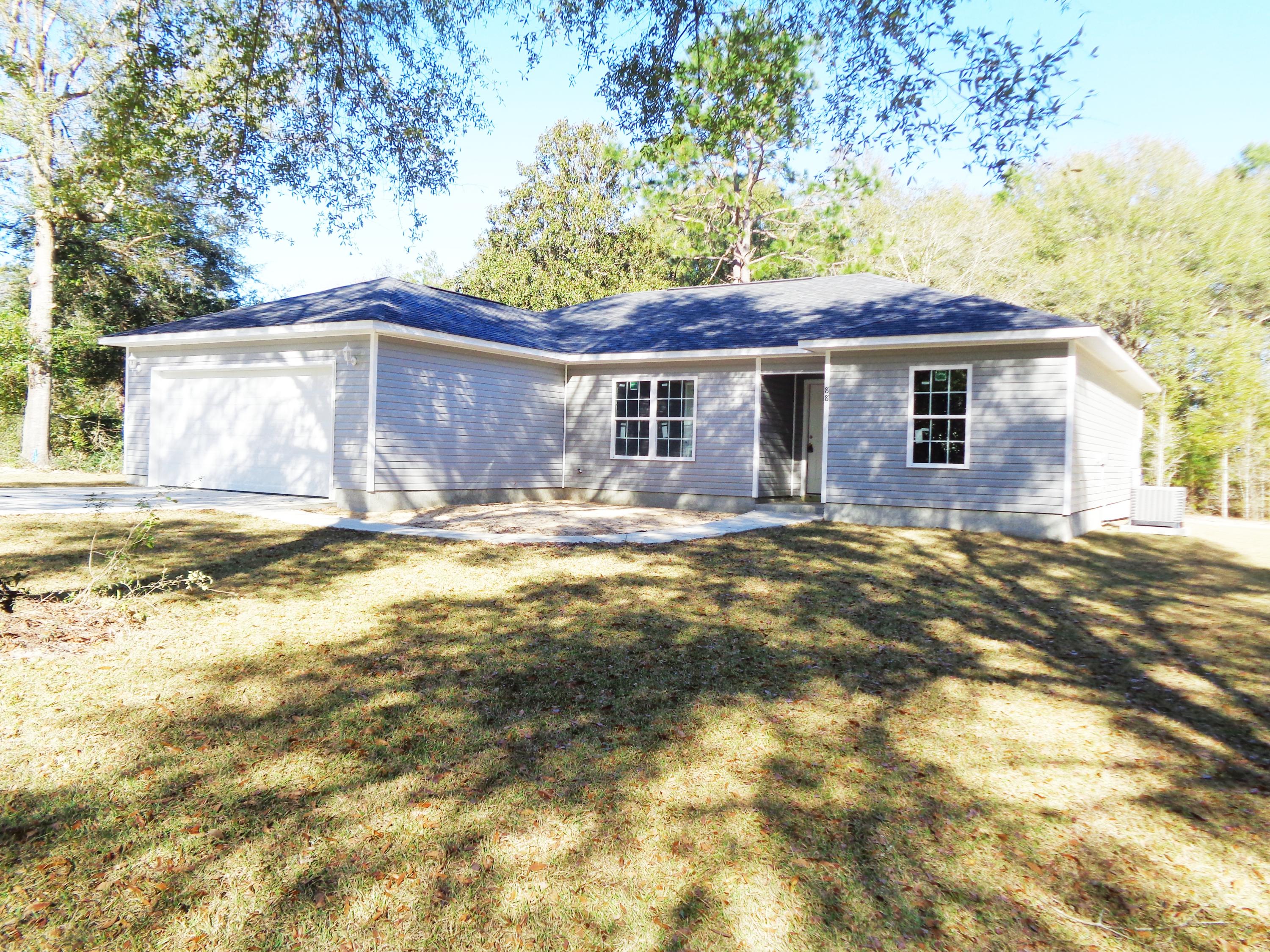 THIS NEW CUSTOM BUILT HOME HAS ALL THAT YOU ARE LOOKING FOR IN A HOME. 4 BEDROOMS 2 BATH SPLIT FLOOR PLAN WITH ALL THE EXTRAS. HOME WELCOMES YOU WITH A LARGE FOYER INTO THE LIVING ROOM THAT IS PERFECT FOR FAMILY AND GUEST ALIKE. KITCHEN HAS AMAZING CABINETS WITH PLENTY OF SPACE AND IS ATTACHED TO THE DINING ROOM. MASTER SUITE OFFERS A LARGE BEDROOM WITH TREY CEILINGS, A GREAT MASTER BATH TO INCLUDE A HUGE WALK IN CLOSET. THE 3 ADDITIONAL BEDROOMS ARE PERFECT FOR YOUR FAMILY. HOME HAS CUSTOM CABINETS, LUXURY VINYL PLANK FLOORS, TOP GRADE APPLIANCES MINUS A REFRIGERATOR, OPEN CONCEPT AND LOCATED JUST MINUTES TO JUNIPER LAKE BOAT LAUNCH GREAT BUY IN THIS MARKET.