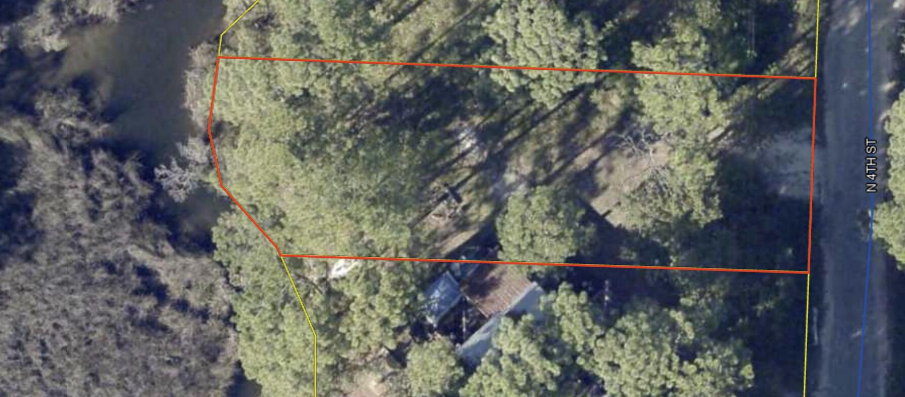 Investor opportunity! Waterfront lot offered for sale. Large tree removal and root raking has been complete.

Neighboring lot also offered for sale.