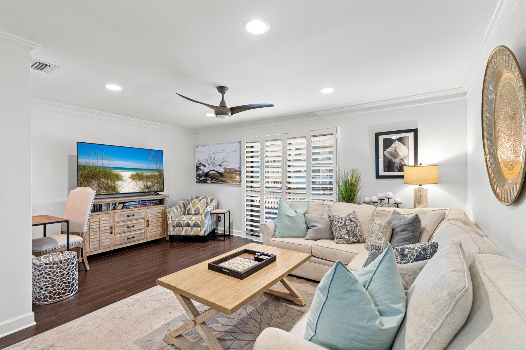 Beach life at an affordable price rings true with this townhome located across the street from the beach with GULF VIEWS! Covered parking for two vehicles and a small grassy area make this townhome a very unusual find! Conveying completely furnished this property features tile floors throughout, stainless steel appliances, beautiful tiled master shower, built in bunk beds, and much more! Not one but two balconies is where sunset dreams come true! Low HOA dues, only 10% down needed for financing, a beautiful setting and a community pool make for a prime opportunity! For those looking for an investment opportunity this property performs very well and has extensive bookings now through July! LOW HOA fees of only $1100 a quarter includes fiber internet, DirectTV, groundskeeping, roof and stucco maintenance.