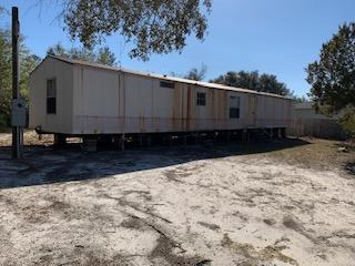 Check out this awesome investment opportunity located right in the heart of Gulf Breeze.  With new construction being built all around you could build your dream home on this parcel too. There is a mobile home on the property that just needs a little TLC or have it removed and you have .4 of an acre to build on. Don't pass this great deal up!