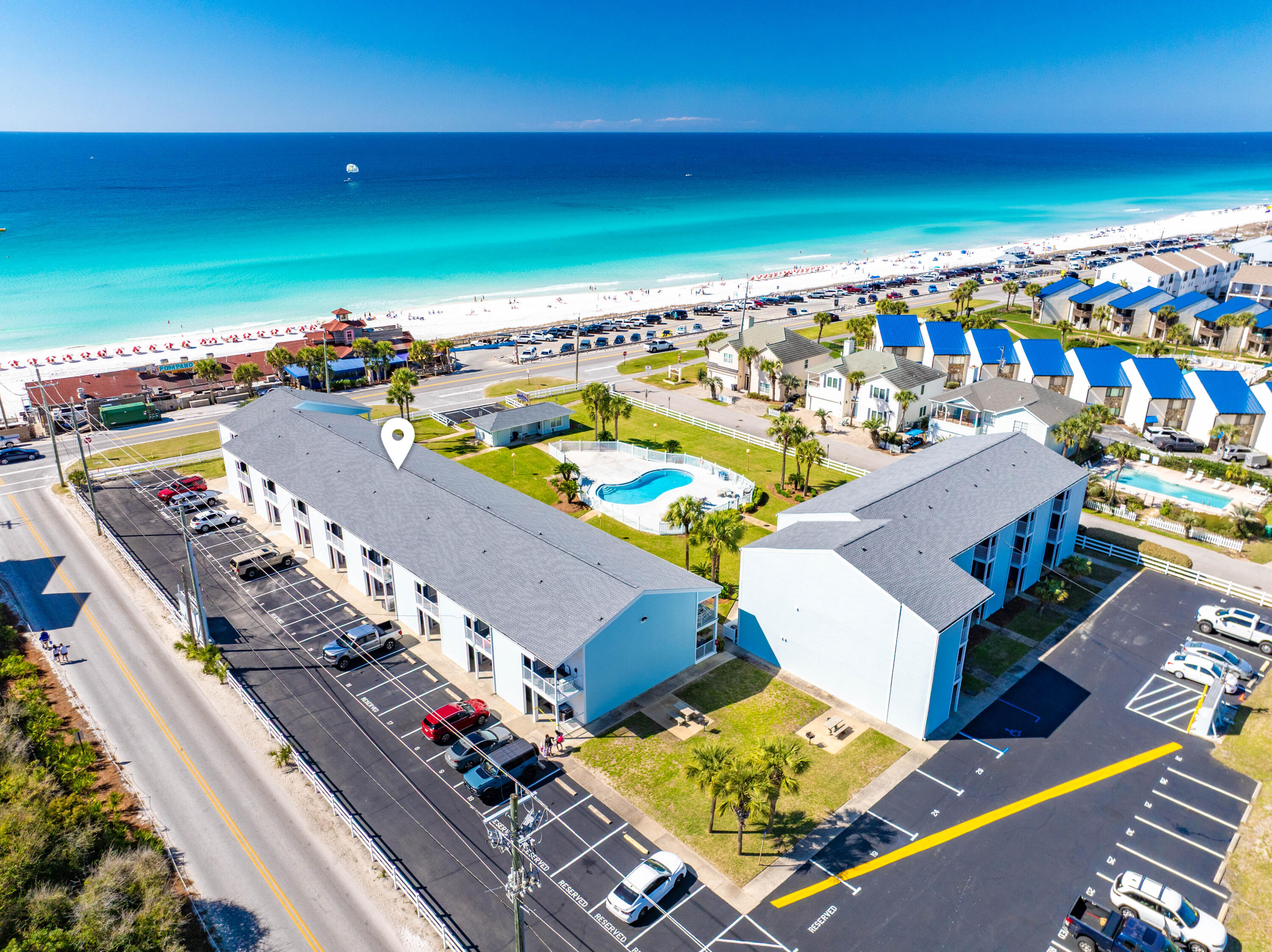 Welcome to your next chapter on the Emerald Coast. This beautifully renovated second-floor condo in Miramar Beach delivers the kind of Gulf Coast lifestyle most people only dream about. 

With two private balconies offering stunning views of the Gulf of Mexico, you can sip your morning coffee while watching the waves roll in from the front balcony, then move to the rear balcony to catch a breathtaking sunset painting the sky in shades of amber and rose.

Step inside and discover a home that has been thoughtfully transformed from top to bottom. The kitchen showcases new quartz countertops, fresh cabinetry, and a large counter island that serves as the perfect gathering spot for entertaining guests or enjoying a casual meal. New luxury vinyl flooring flows seamlessly throughout the space, while shiplap accents and a fresh coat of paint create that unmistakable coastal charm. Every detail has been carefully considered to blend modern comfort with beachside character.

The living areas are bright, inviting, and move-in ready with all-new furniture and décor included in the sale. One bedroom features a cleverly designed built-in twin-over-twin bunk, making it ideal for families, guests, or maximizing rental potential. The second bedroom offers a comfortable retreat after long days spent soaking up the sun and salt air.

Beyond the interior, this property has undergone significant exterior upgrades as well. New impact-resistant doors and windows provide peace of mind during storm season while improving energy efficiency. Fresh exterior siding and paint give the building a crisp, updated appearance that reflects the quality found inside.

Location is everything, and this condo delivers in spades. Perched overlooking the community pool, you are just steps from the sand and surf. Pompano Joe's, a beloved local favorite for fresh seafood and waterfront dining, sits directly across the street. 

Scenic 98 stretches out at your doorstep with miles of bike paths perfect for morning rides along the coast. Nearby, you will find Surf Hut for casual bites, the legendary Crab Trap Destin for Gulf-to-table dining, Silver Sands Premium Outlets for world-class shopping, and Destin Commons for even more retail and entertainment options.

Whether you are searching for a profitable investment property with strong rental appeal, a relaxing secondary residence for weekend escapes, or even a full-time home where every day feels like vacation, this condo checks every box. 

Sold fully furnished and ready to generate income or welcome you home immediately, there is nothing left to do but unpack your bags and settle into the rhythm of coastal living.

Opportunities like this along Scenic Gulf Drive do not come around often. The renovations have been completed, the views are waiting, and the beach is calling. Schedule your private showing today and discover what life looks like when the Gulf of Mexico is your backyard.