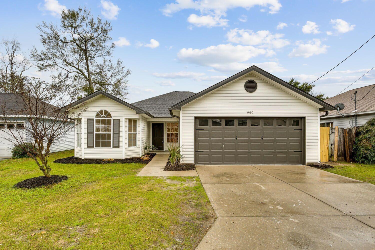 More pictures coming soon. Open House Saturday, May 21st 1pm-3pm. A stunning 3BR/2BA home in the heart of Fort Walton Beach. This updated charming home has great curb appeal that draws you in. Once inside, you will be greeted with luxurious and modern features throughout the home. This is where you will find everything you've been dreaming of! Featuring an incredible kitchen with cabinetry boasting a sleek modern color. All new appliances, new washer and dryer that conveys. Roof 2018, HVAC & HWH 2021. Subway tile backsplash, upscale solid granite countertops. New bathroom vanities, new blinds, fans in every room, plank flooring throughout the open living areas. Reme Halo vent cleaner, maintenance free gutters, well with lawn pump/sprinklers, finished garage, thermostat control attic fan.