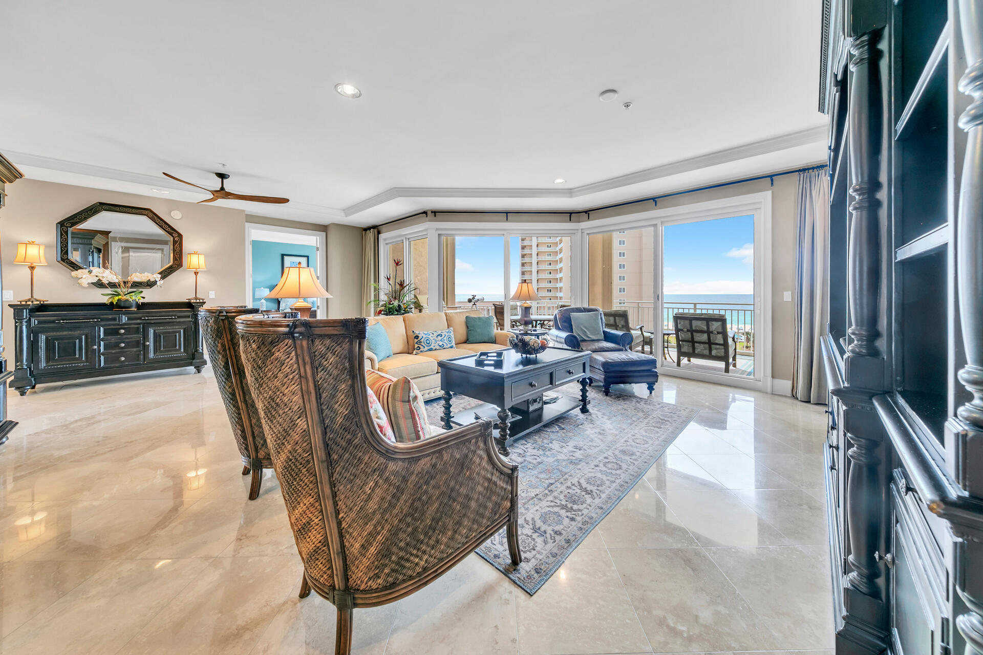 Rare opportunity to own the largest floor plan in Grand Dunes II! Magnificent Gulf views abound from this incredible 4 bed 4 bath masterpiece. Rarely do these units come on the market and especially one as exquisite as this. This luxurious open concept floor plan lives large with 3,030 square feet. Upon entering the unit through your private elevator, you are immediately welcomed with breathtaking views of the Gulf. The tastefully crafted custom woodwork in this villa is incredible and provides a warm atmosphere. The kitchen is a chef's dream, fully equipped with stainless steel appliances and granite counter tops. The formal dining room offers easterly views of the water and beautiful sunrise views. The master suite boasts wood beams in the ceiling and two large walk-in closets. Inside the master bath you will find a jetted tub along with a luxurious walk-in shower. Each bedroom in this unit offers ultimate privacy complete with an ensuite bath. The oversized balcony offers expansive views of the Gulf and features a built-in gas grill. The spacious balcony is great for entertaining and relaxing after a long day at the beach. Hurricane shutters allow you to lock and leave the unit secure. This rental restricted unit conveys fully furnished.