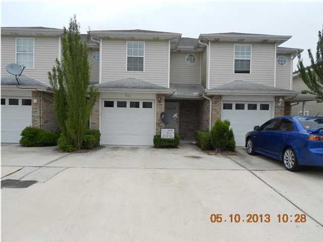 Great townhome with 2 large bedrooms with baths and a guest bath down. 1 car garage with 2 outside parking spaces. New stove. No pets.