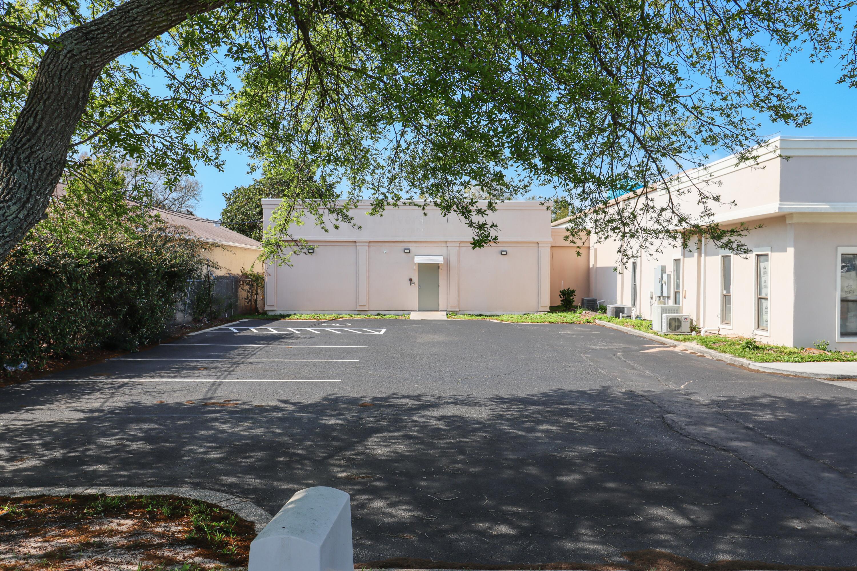 Now available for sale, 185 Stahlman Avenue A is a ±4,060 SF office and warehouse facility perfectly positioned for an owner-user or investor in the heart of Destin. Constructed in 1998 with durable concrete block, this asset offers a versatile layout designed to support high-demand business operations. The interior features four private offices, an open workspace, and a breakroom, alongside two specialized server rooms. These tech-ready spaces include elevated, removable flooring for efficient cable management and airflow, making the property uniquely suited for technology, telecom, or data-driven users. The warehouse component provides functional logistics with a dock-high loading position and approximately 12-foot clear height, ideal for storage or light industrial use. For businesses requiring significant power and reliability, the building is equipped with three-phase, 1,000-amp electrical capacity and a dedicated backup generator. Strategically located at the west end of the Azalea and Mountain Drive commercial corridor, the property sits less than a quarter-mile from Hwy 98 and Destin's harbor and entertainment district, offering convenient access, strong surrounding amenities, and proximity to one of the area's most active commercial and tourism hubs.