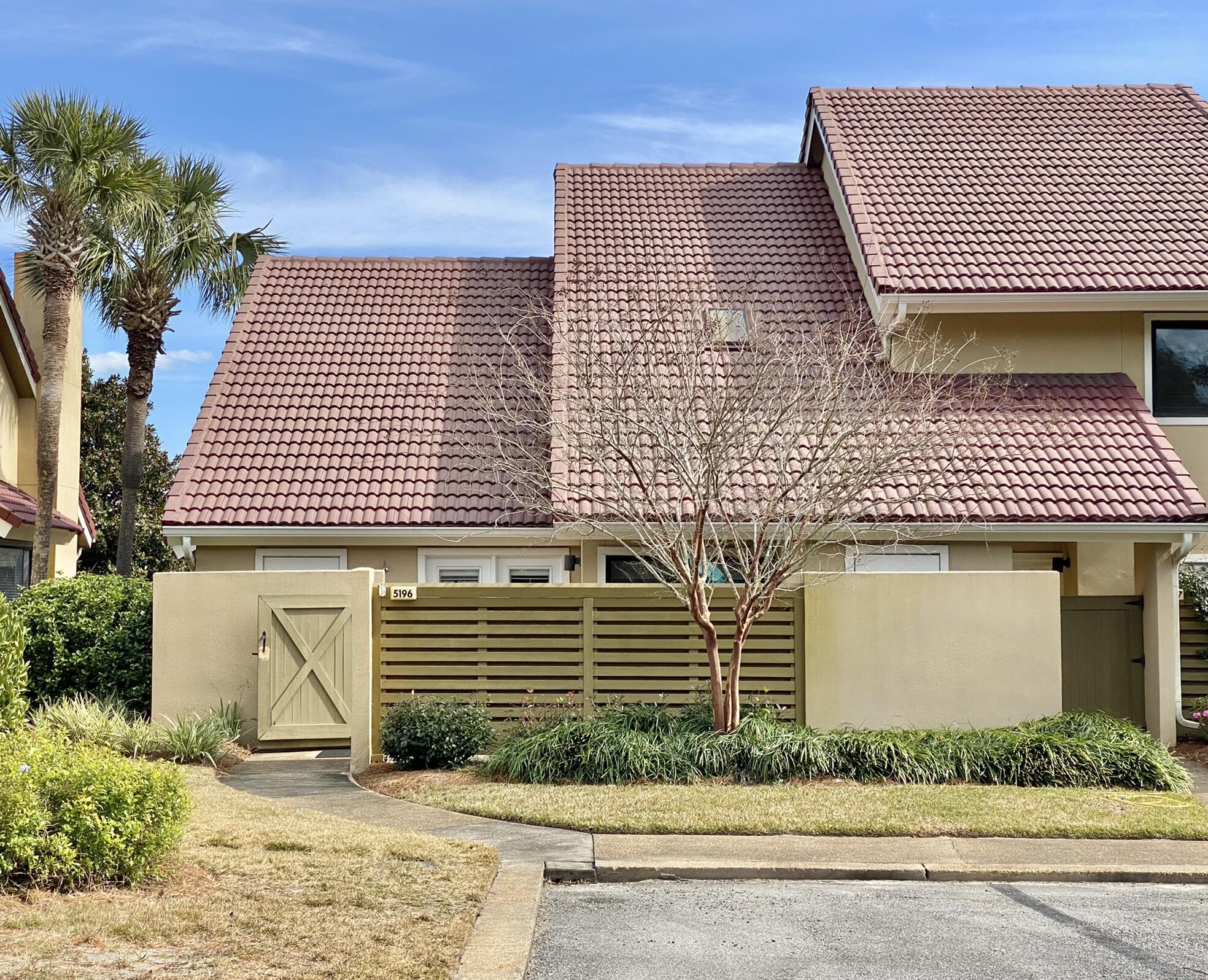 This beautiful 3 bedroom Beachwalk has never been on a rental program.  It's view is the best view in Beachwalk and you will love sitting on your deck watching the ducks come by and the Heron's visit too.  You will have morning sunrises on your lake front deck and sunsets on your back deck.  The lake front deck has Trek flooring with aluminum hand rails and stainless steel wire cable railings.  
Inside the floorplan is very open and contemporary with leather couches and vaulted ceilings in the living room.  The dining room also has contemporary leather chairs and a glass table.  THe kitchen has stainless appliances and granite counter tops
with a breakfast bar. 
there are 2 bedroom suites on the first floor that both have outdoor sitting areas.
There is a loft and large master upstairs with a newly renovated mater bath and walk in closet.  Master also has a balcony that looks onto the lake.  Home has been meticulously
cared for and it shows.
