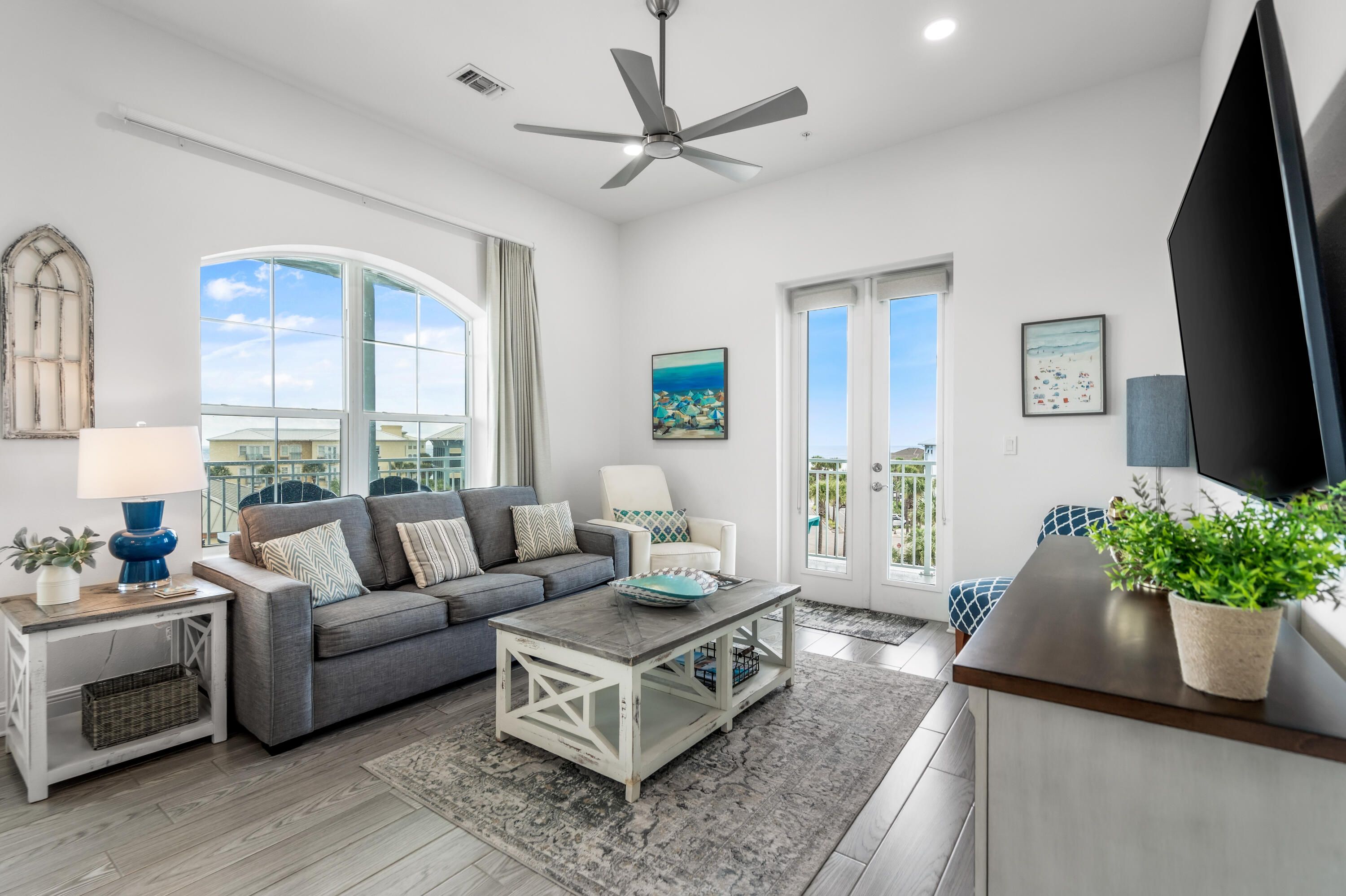 GULF PLACE RESIDENCES CORNER PENTHOUSE #301! This immaculate Gulf Place Residences 3 Bedroom, 2 Bathroom condominium features a large open plan, 10' ceilings, wraparound balcony and beautiful views of the Gulf and overlooks the amphitheater. This property is being sold fully furnished and decorated! The kitchen offers a large island that doubles as a breakfast bar and includes a pantry, quartz countertops, stainless steel appliances, recessed lighting, modern flooring and plenty of room to operate for the whole family. Ample natural light pour in to the living space and bedrooms while beautiful sunsets are captured from the expansive balcony.
