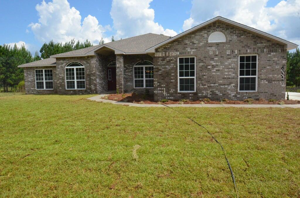 Beautiful 4 Bedroom 3 Bathroom 2 Car Oversized Garage (20'x26'), 2554 sq. ft. home with covered back porch. Includes stainless steel appliances, granite countertops in kitchen, tile in all wet areas, and 42 inch upper cabinets standard. Large sliding glass door leading from master bedroom out onto the back covered patio. 3rd bath has a door leading out to the covered back patio as well. Perfect for those that like to spend time out side.  Situated on a 1 acre wooded home site in the naturally picturesque Yellow River Plantation Subdivision, this gem will make a great home!