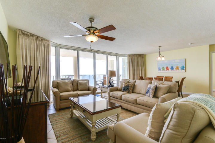 This beautiful 1769 square foot, extensively upgraded, twelfth floor, 3bed/3bath condo is considered by many to be the best floor-plan on the beach! Property enjoys floor-to-ceiling views of the Gulf from all three bedrooms and great room that steps out to one of two large private balconies. Extensively remodeled and meticulously maintained. Conveys fully-furnished, turnkey, and rental ready. Custom tiled floors means easy clean-up and ultra-low maintenance. Granite, shaker cabinets, and Stainless Steel in the kitchen! Both master bedrooms are gulf front and have access to the enormous main balcony. Both also have en suite baths that feature new stained maple cabinets, custom showers, and double vanities. Third bedroom can be converted to a standalone lockout to maximize rental potential