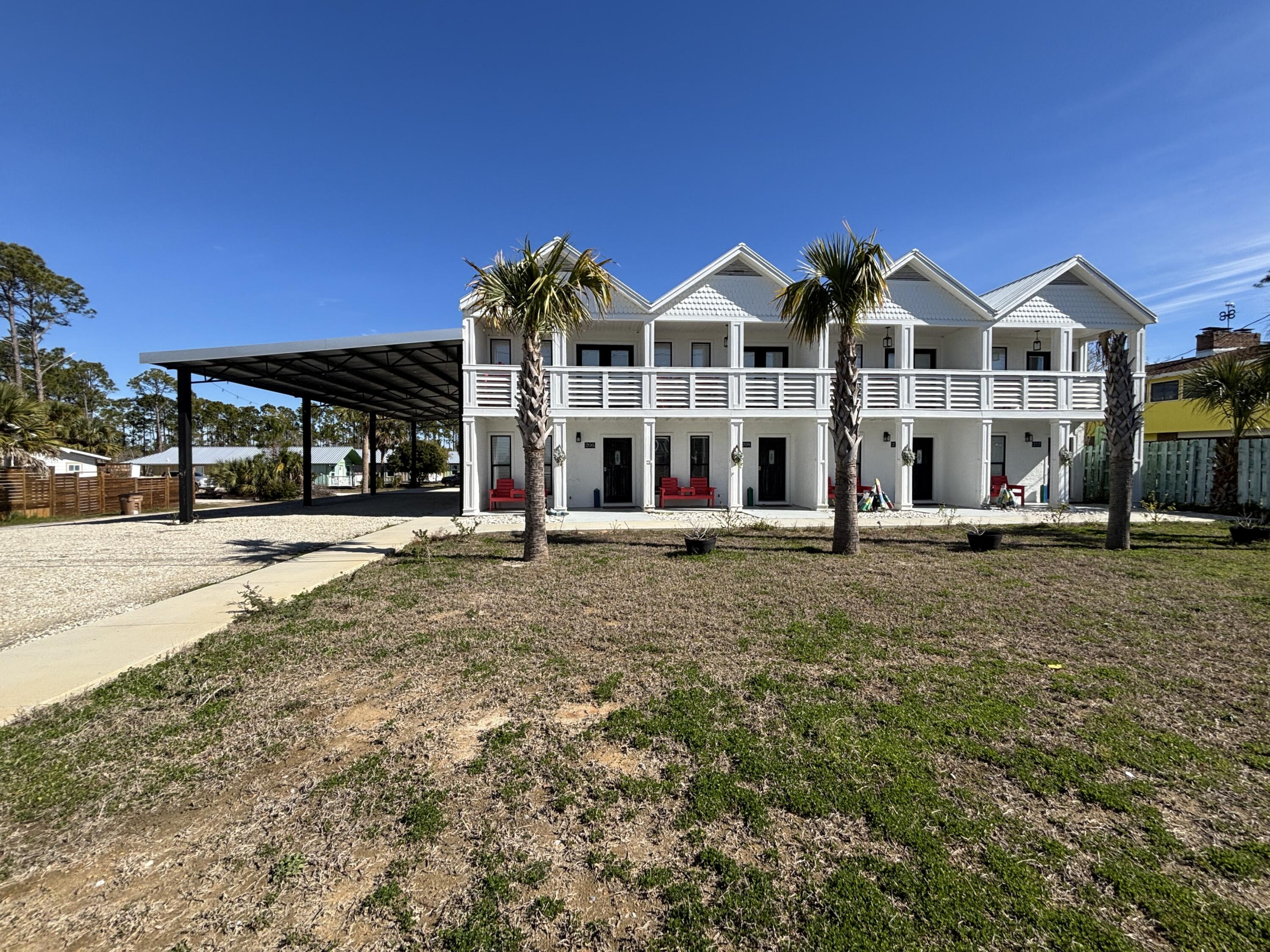 Turn key quadplex across the street from the Gulf of America. Each unit is a 2 bedroom 1 full and 1/2 bath with an open floor plan and gulf views. These completely furnished units has a covered front porch, second story covered deck off of a top bedroom with Gulf of America views. Need to entertain or just want extra space? There is a spacious back patio that is partitioned for privacy, large back yard, and side covered parking gives the property many options for added features or expansion versus similar beach multi unit residences. There is a recorded beach access pedestrian easement for easy beach access right across the street. Conveniently located equidistant between Port St Joe and Mexico Beach for a variety entertainment options. The subdivision is decades old and has its own ingress and egress road with no thru traffic. NO HOA!! All units are in an X flood zone per the Gulf PA website, part of the added covered parking is in an AE zone. Verify if important. Some dimensions taken from the Gulf County Property Appraiser's website, please verify if important.
