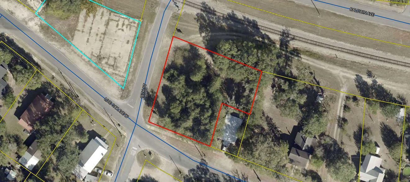 Zoned C-1  Priced to sell.  High traffic area.  Corner lot. Great visibility.  Awesome business location .  Corner lot.  Can be seen from Baldwin Ave, across the RR tracks from City Hall.  One block east of the post office.