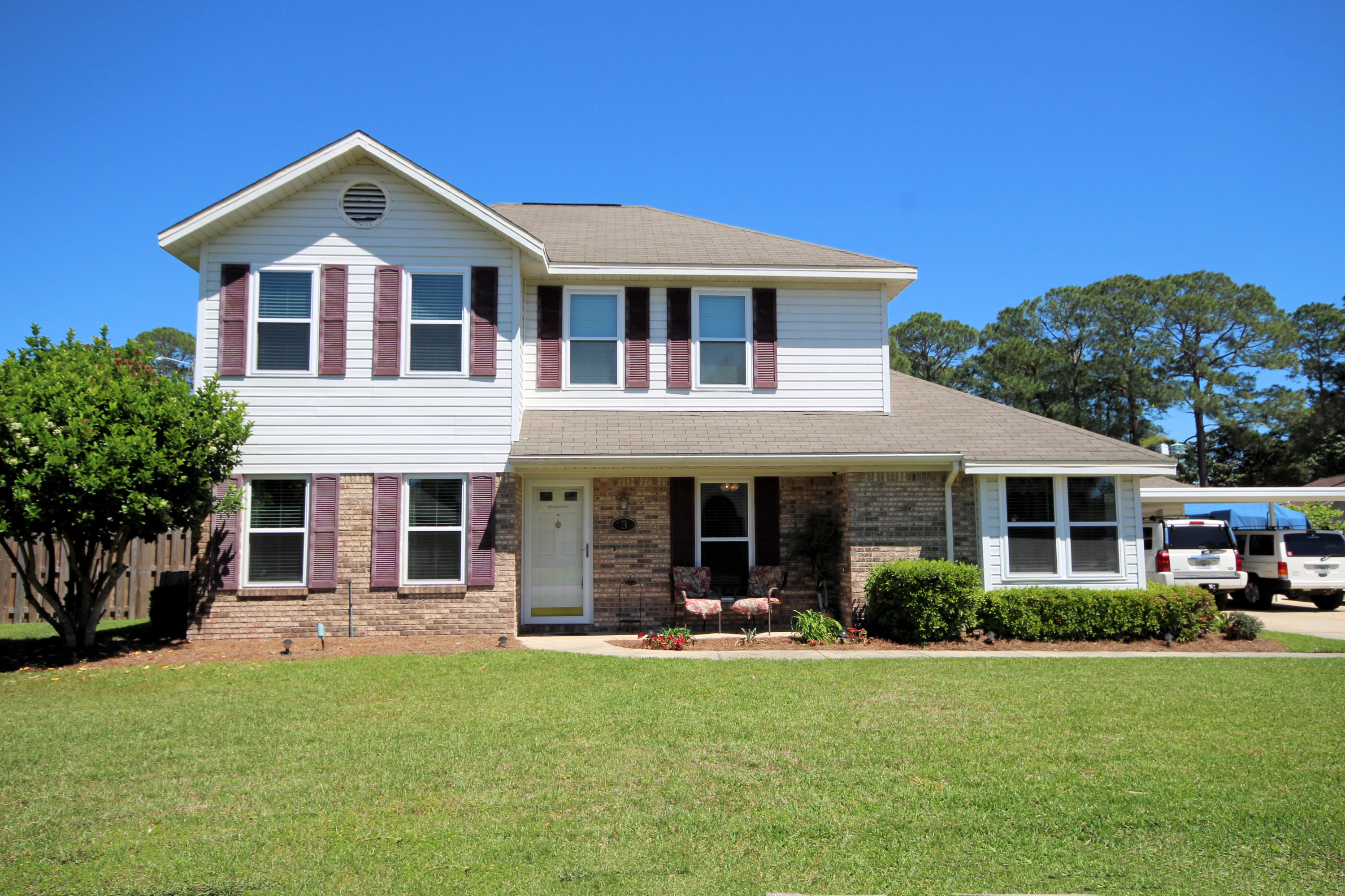 Accepting back up offers. Home is under contract with a 72 hour Kick-Out Clause. Lovely 4 bedroom home has it all. Renovated kitchen, granite counters, wood cabinets, stainless appliances, tile flooring and a breakfast bar. New high impact windows installed. Heated and cooled sunroom overlooks Sparkling blue salt water, double pump, Polaris swimming pool. Well points surround pool. Two living areas, one in the front of the home and another family room with fireplace along the back of the home. Eat-in kitchen has plenty of room for a table and a formal dining room is located along the front of the home. First floor Master has two closets (currently one is a small office) and ensuite bath. Handscraped wood flooring throughout downstairs. Carport, boat parking, and a detached garage.
