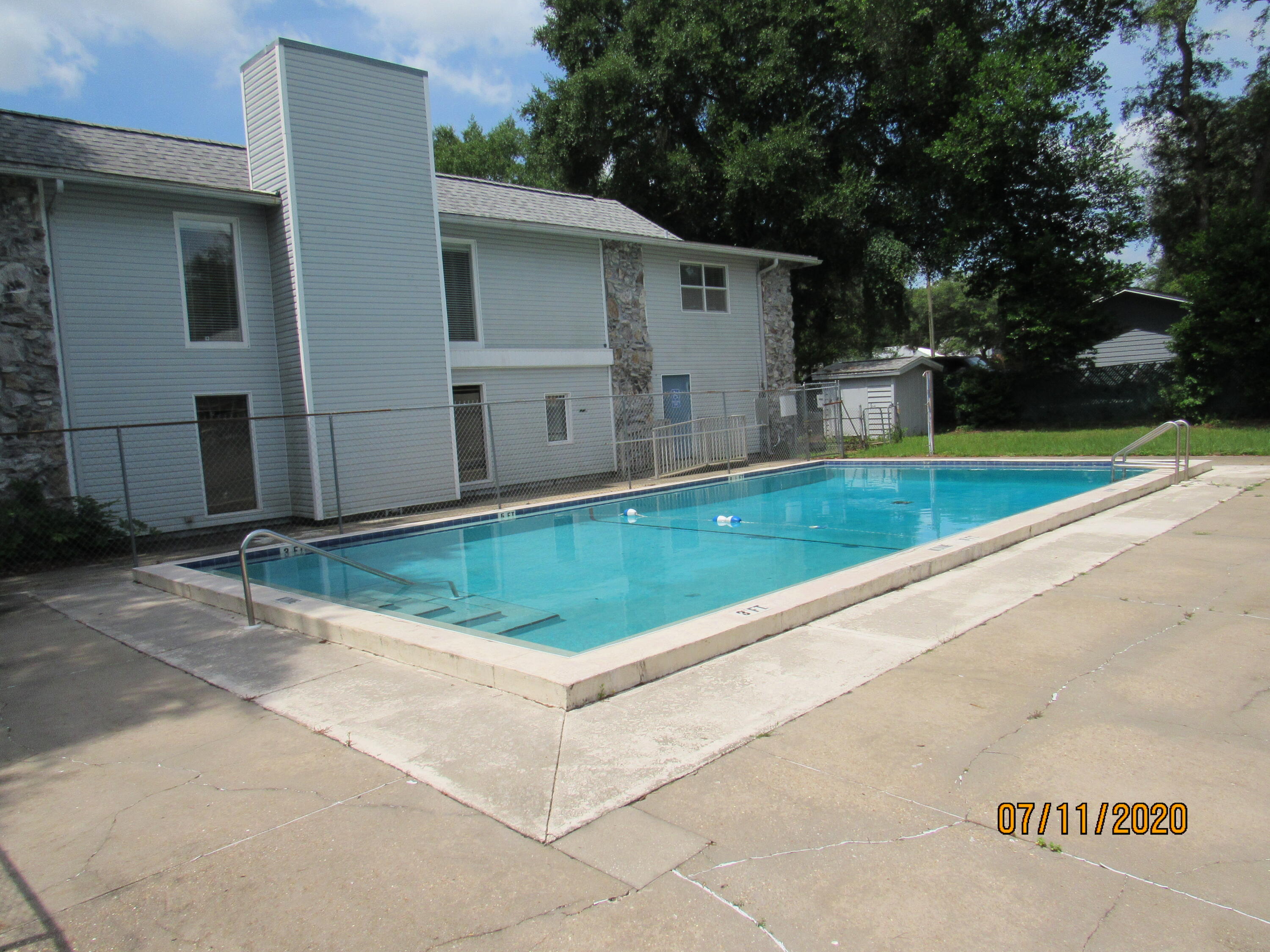 Conveniently located a stone's throw from the college as well as bases, schools, restaurants, shopping, the beach, and a medical center, this 1 bedroom 1 bath condo features neutral paint, tile in the living/bedroom, a full kitchen, and a spacious living room. Rent includes water, garbage, pool care, and lawn care, and there are laundry facilities on site. Cats may be considered with prior owner approval and a non-refundable pet fee. No smoking allowed, including vapes. Photos are from a comparable unit.
