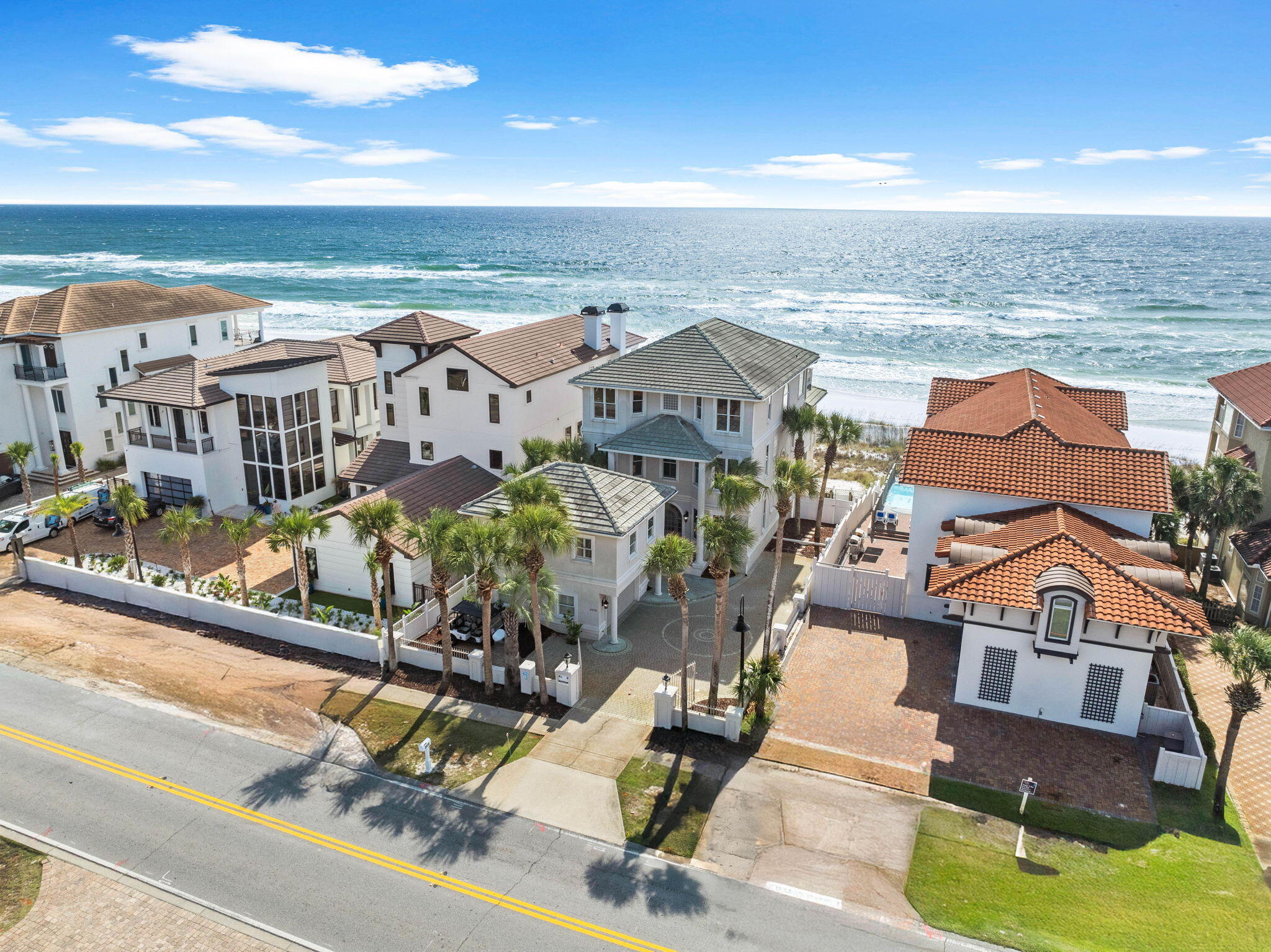 Discover the pinnacle of coastal luxury at Kings View—a breathtaking Gulf-front estate in Destin that redefines beachfront living. 

This fully furnished 7-bedroom haven offers direct private beach access and a secluded one-bedroom carriage house, making it the perfect escape for lavish entertaining or serene retreats. Step inside to experience panoramic Gulf views from every angle, and delight in a chef's kitchen designed to impress, complete with dual islands and top-of-the-line appliances. 

At Kings View, opulence and comfort merge seamlessly, offering an unmatched setting for unforgettable vacations or luxurious living. Step into the heart of the home and be captivated by the open-concept living, dining, and chef's kitchen, all designed to showcase breathtaking panoramic views of the Gulf. The gourmet kitchen, complete with dual islands and high-end appliances, makes every meal an event and every gathering unforgettable.

The first floor features a serene queen bedroom with an en-suite bath, providing comfort and seclusion for guests. An elegant curved staircase leads to the second floor, where
luxury awaits: a tranquil queen suite with a soaking tub and separate shower, and a unique queen-over-queen bunk room with a twin trundle, both featuring private baths. The lavish master suite, with its king bed, spa-inspired bath, and private balcony, offers front-row views of the Gulf's shimmering waters.

The third floor is an entertainer's paradise, complete with two additional queen bedrooms, a game room with a billiards table, and a cozy TV lounge ideal for memorable gatherings. A separate carriage house offers its own one-bedroom retreat with a private bath, ensuring guest privacy and comfort.

Kings View's residents enjoy exclusive access to Destiny Shores' premier amenities, including a luxurious community pool with a lushly landscaped deck and breezy gazebo, as well as a state-of-the-art fitness center. Nestled along Scenic Gulf Drive, this sought-after location combines coastal beauty with proximity to fine dining, boutique shopping, and local treasures. 

Live the dream at Kings View, a rare blend of timeless elegance and modern beachfront luxury.