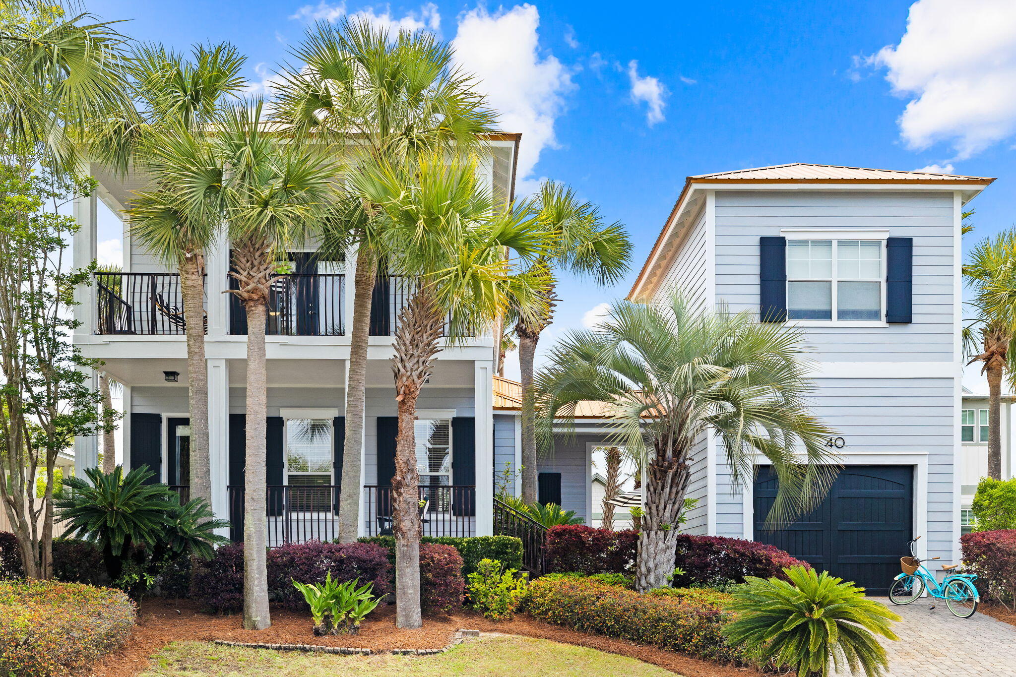Ready to live the Florida Dream?  This expansive, Florida cottage in the Village of Blue Mountain Beach has it all! This home offers spacious porches and a breezy layout. Inside, you'll find a kitchen, fireplace, living area, and master suite on the main. Upstairs, there's a 2nd master bedroom and two additional bedrooms. Bonus, there's a carriage house for guests!

And that's not all! Village of Blue Mountain Beach gives you a pool, cabana, putting greens, and more. Another bonus, the beach is just a short walk or bike ride, less than 1/2 mile way!  With all of the local amenities of 30A just a stone's throw away, there's never a dull moment.