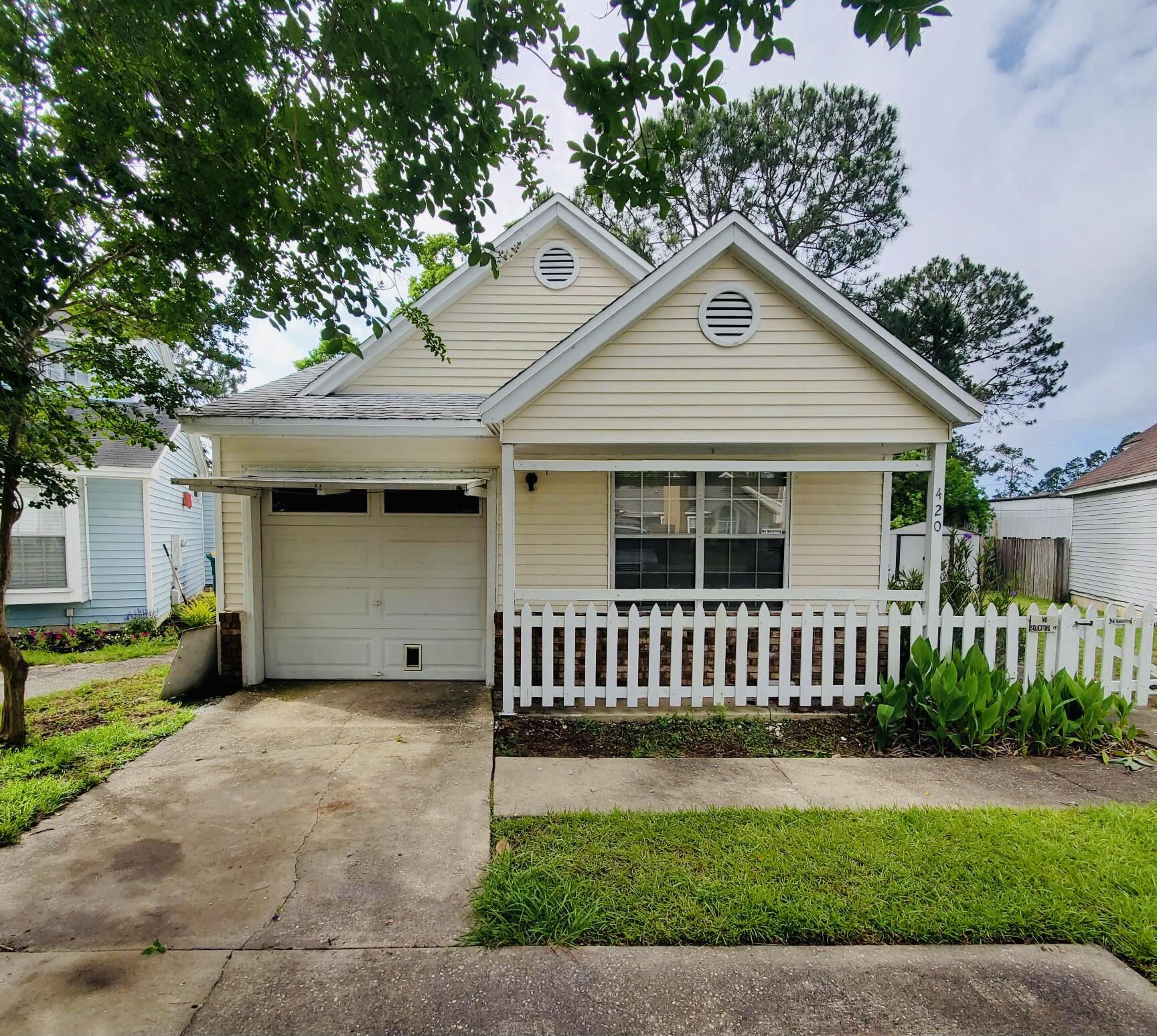 Cute 3 bed/2 bath/ 1 car garage in Green acres in close proximity to both AFB's, shopping, schools, college campus, restaurants, & worships centers.  Home has a newer roof, HVAC, lights, & back door, some stainless appliances, & a brand new garage door opener to be installed. Home is in great shape but in need of some updating, paint, flooring, bathrooms, & counter tops. Great for an investor, Flipper, or DIY'er! Home interior features vaulted ceilings, fireplace, cedar wall accents, & sky lights. The yard has plush green St. Augustine grass, A beautiful pine, white picket fence, & a nice size yard building. Unique to this home is the side entrance that provides privacy from the street traffic. Private covered back porch for outside relaxing. Home is ready for a face lift & priced to sell!
